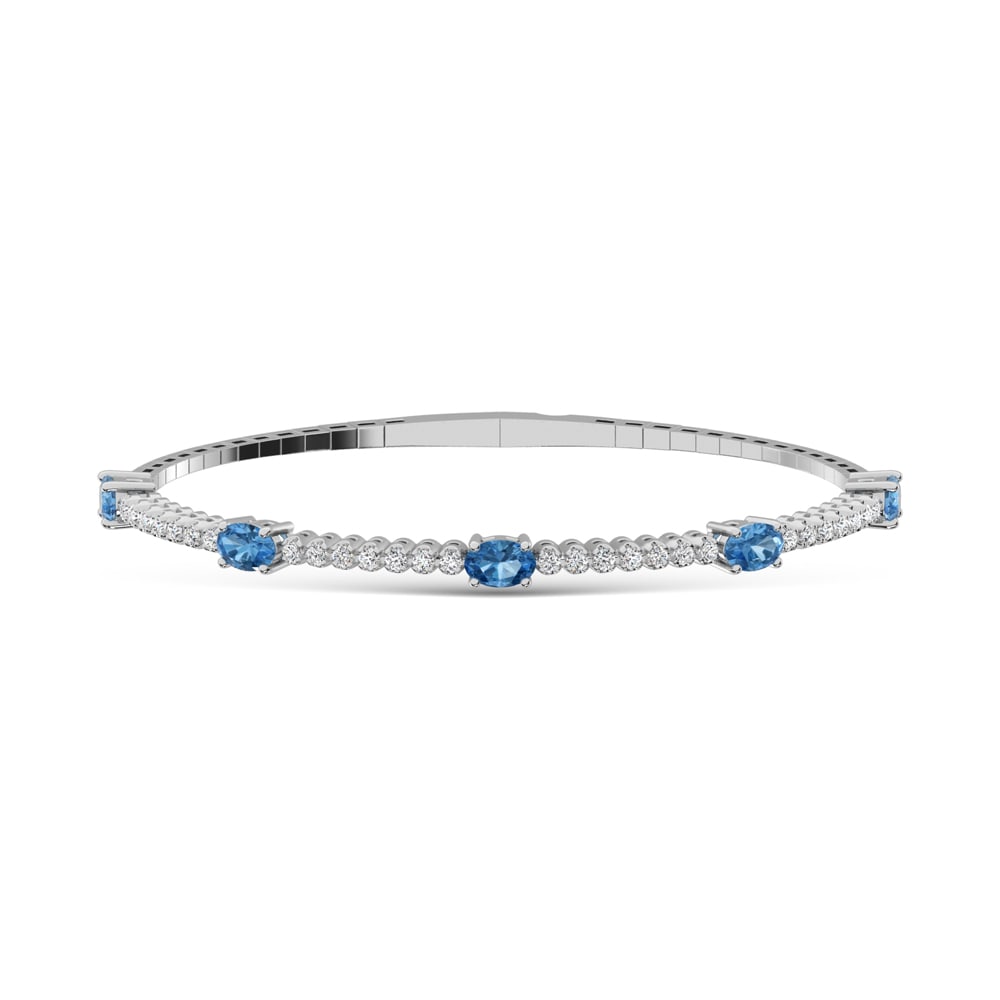 14K White Gold 3 5/8 Ct.Tw. white and Oval Shape Blue Lab Grown Diamond Bangle: 14K White Gold 3 5/8 Ct.Tw. white and Oval Shape Blue Lab Grown Diamond Bangle Crafted in 14K White Gold, this bangle features white and oval-shaped blue lab grown diamonds totaling 3 5/8 Ct.Tw., deli
