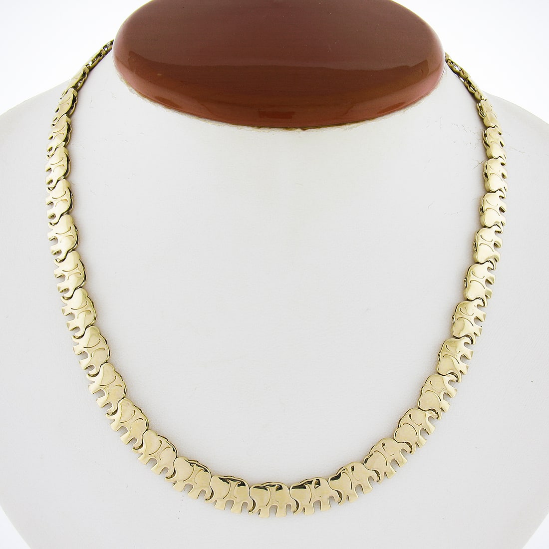 Italian 14K Yellow Gold 16 Inch 7.9mm Elephant Link Necklace: Italian 14K Yellow Gold 16 Inch 7.9mm Elephant Link Necklace This exquisite necklace features a striking design crafted from Italian 14K solid yellow gold. The 16-inch chain showcases a polished finis