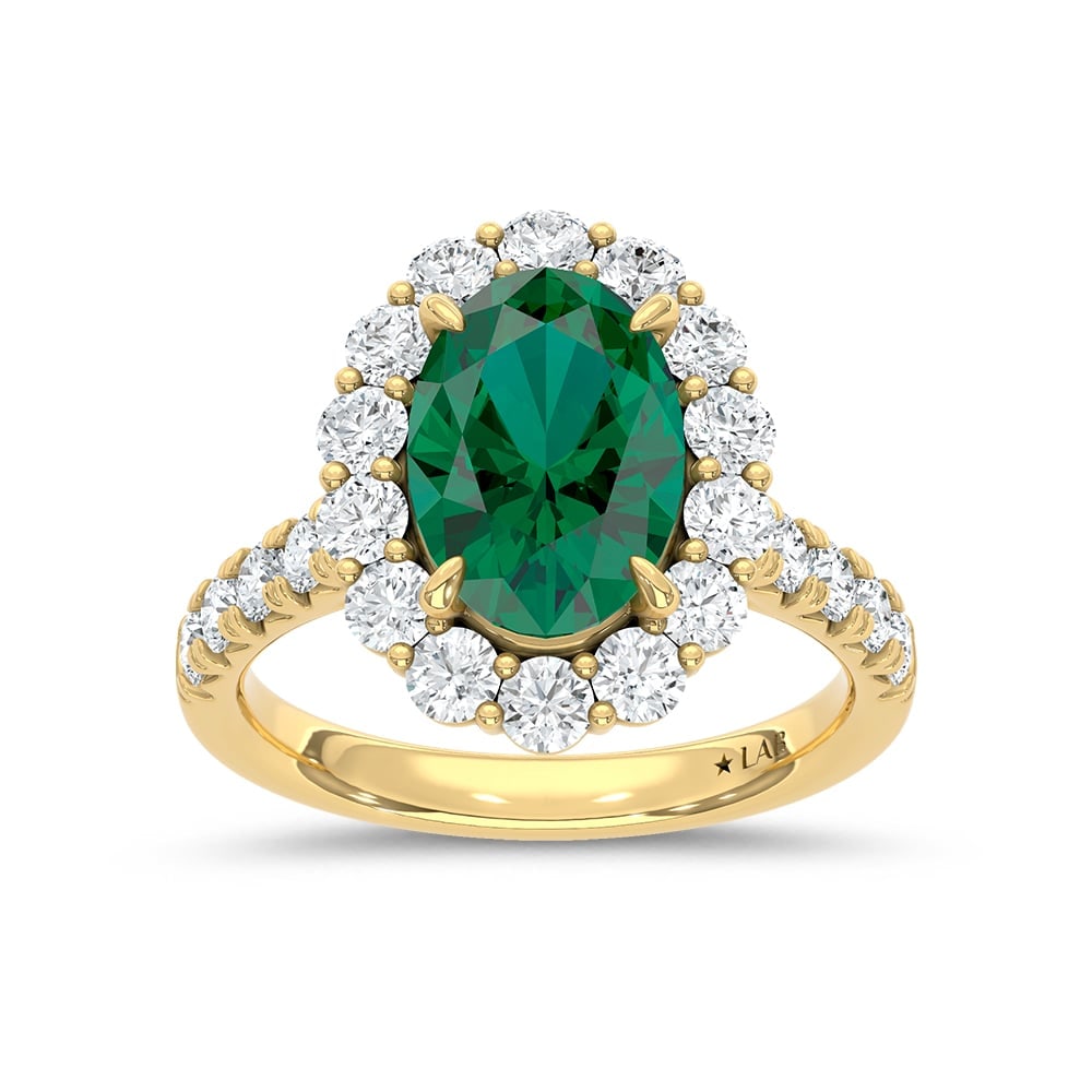 14K Yellow Gold Lab Grown Diamond 4 7/8 Ct.Tw. Oval Shape Recrystalized Emerald Engagement Ring: 14K Yellow Gold Lab Grown Diamond 4 7/8 Ct.Tw. Oval Shape Recrystalized Emerald Engagement Ring (Center 3 3/8 ct) Celebrate your love with this stunning 14K yellow gold engagement ring. Its centerpiec