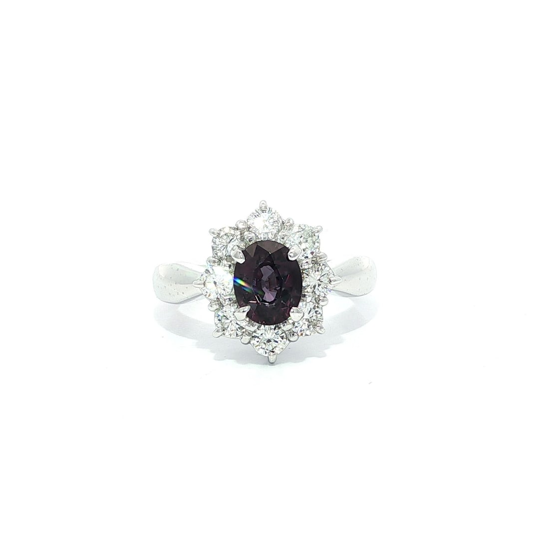 Platinum GIA Certified 1.7ct Color Change Garnet & Diamond Flower Ring: Platinum GIA Certified 1.7ct Color Change Garnet & Diamond Flower Ring This stunning cocktail ring features a captivating 1.7ct oval color change garnet, which transitions from green-blue to purple, b