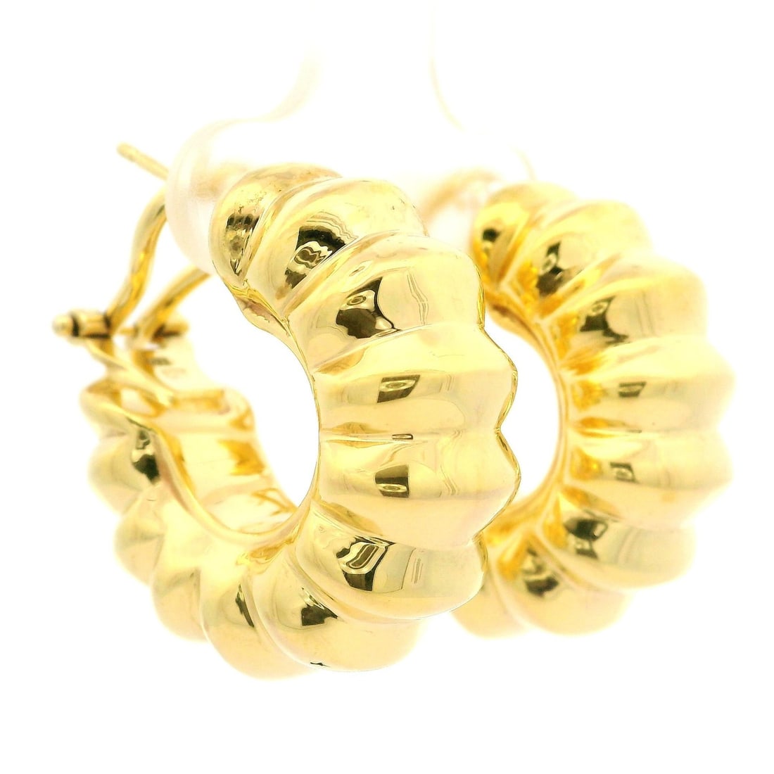 Omega 14k Yellow Gold Polished Huggie Hoop Earrings Italy: Omega 14k Yellow Gold Polished Huggie Hoop Earrings Italy Elevate your jewelry collection with these exquisite Italian Solid 14k Yellow Gold Puffed Design Polished Huggie Hoop Earrings. Crafted from s