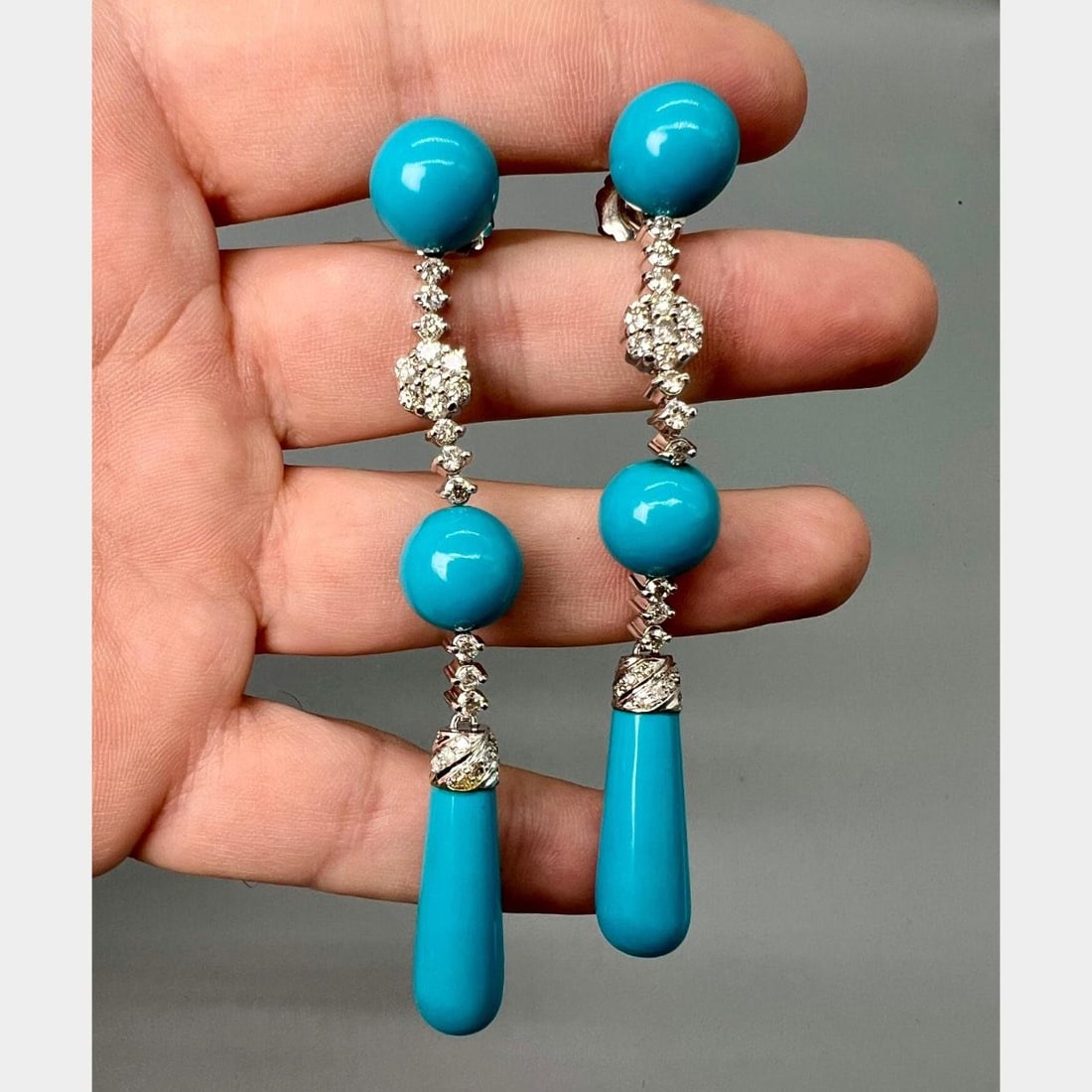 Diamond Drop Earrings in 14K White Gold with 66 Stones 3.5 Inch: Diamond Drop Earrings in 14K White Gold with 66 Stones 3.5 Inch These earrings are crafted from 14K white gold and set with 66 diamonds totaling approximately 3.25 carats. The diamonds feature G-I col