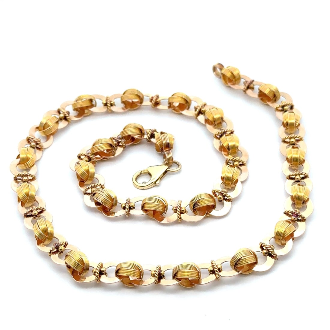 Antique 21 Inch Rose & Yellow Gold Fancy Link Chain Necklace: Antique 21 Inch Rose & Yellow Gold Fancy Link Chain Necklace Discover the elegance of this Antique Rose & Yellow Gold Unique Fancy Round & Knot Link Chain Necklace. Crafted from solid 13-14k rose gold