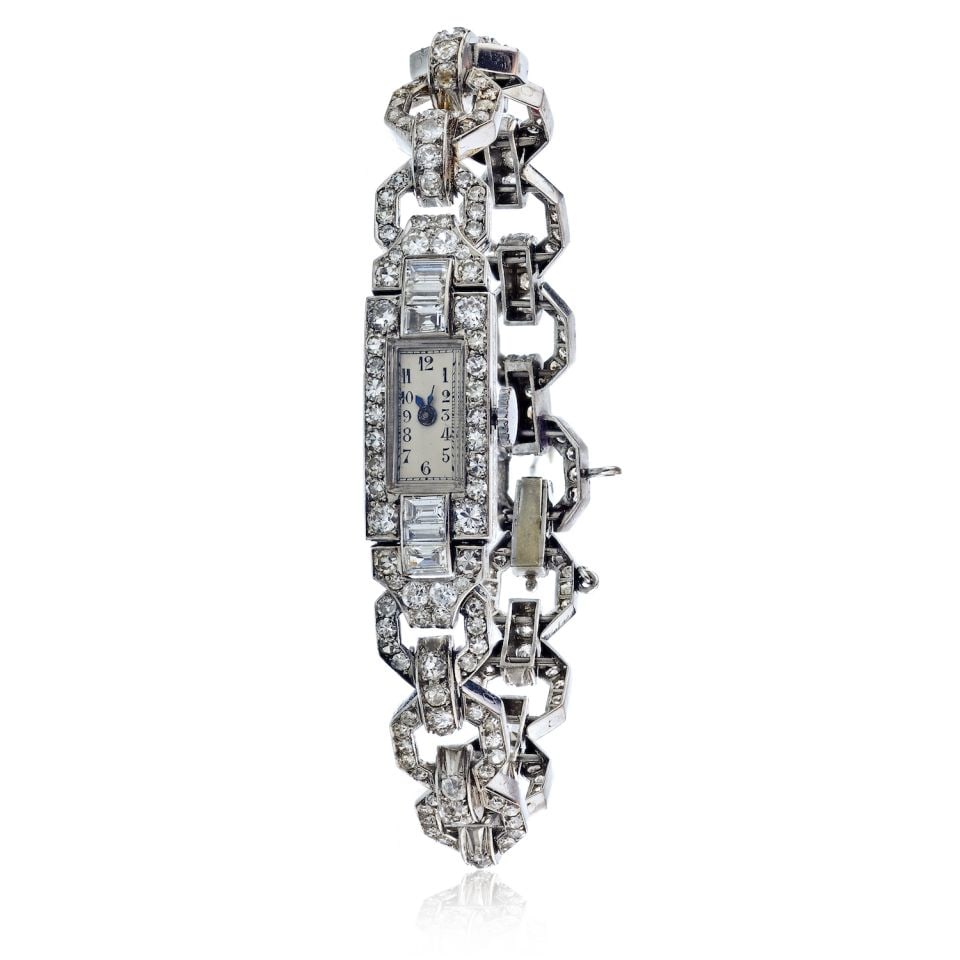 Vintage Art Deco Platinum Ladies Diamond Watch 11 Carats: Vintage Art Deco Platinum Ladies Diamond Watch 11 Carats This exquisite Art Deco ladies' diamond watch showcases a stunning design typical of the period. Crafted from high-quality platinum, this vinta