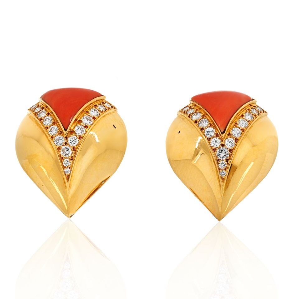 Bvlgari 18K Yellow Gold Coral Diamond Clip-On Earrings: Bvlgari 18K Yellow Gold Coral Diamond Clip-On Earrings These exquisite clip-on earrings by Bvlgari feature a stunning combination of 18K yellow gold, vibrant coral, and sparkling diamonds, making them