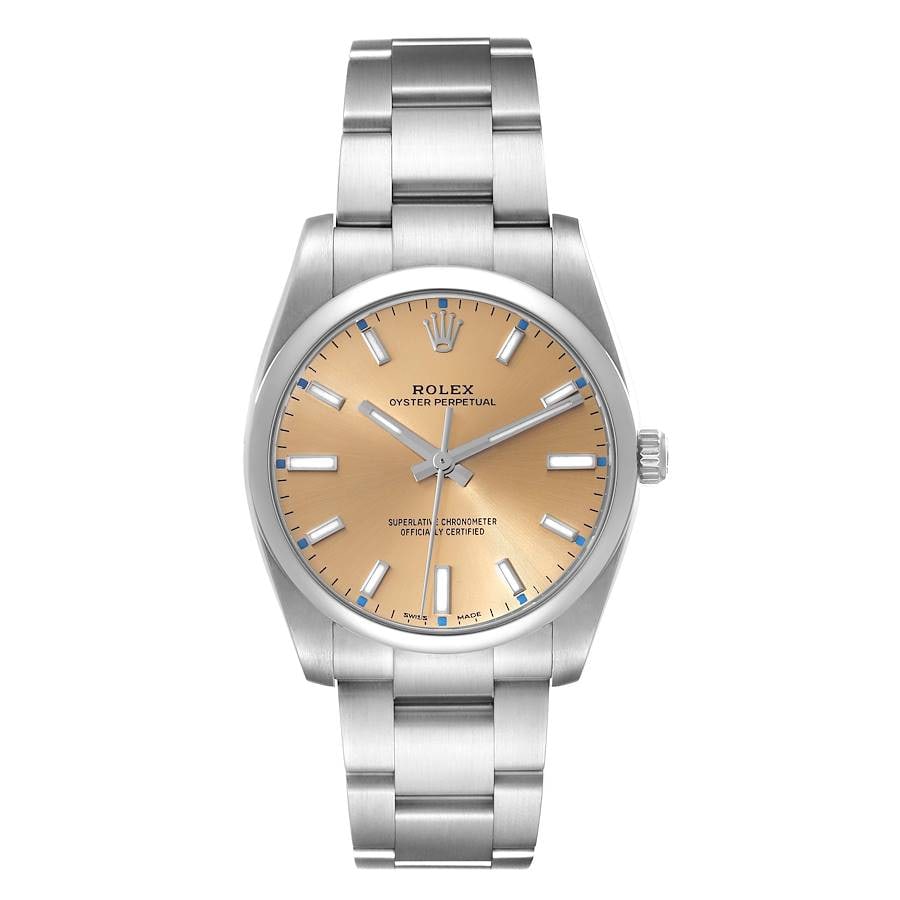 Oyster Perpetual Ref 114200 Unisex Watch with Champagne Dial and Oyster Bracelet: Oyster Perpetual Ref 114200 Unisex Watch with Champagne Dial and Oyster Bracelet This Rolex Oyster Perpetual features a champagne dial and smooth bezel, paired with an Oyster bracelet. The reference n