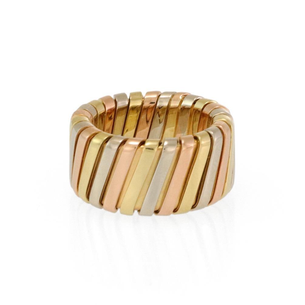 Bvlgari Tubogas 18k Tri-Color Gold 10mm Wide Band Ring Size 4: Bvlgari Tubogas 18k Tri-Color Gold 10mm Wide Band Ring Size 4 Presenting a stunning wide band ring from the prestigious Tubogas Collection by Bvlgari. This authentic piece is expertly crafted from 18k