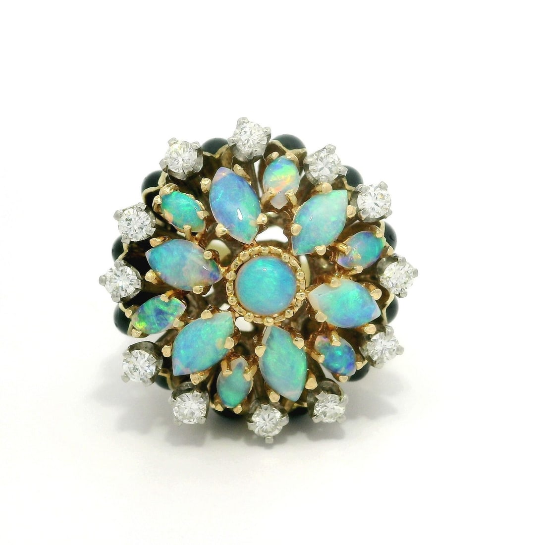La Triomphe 14k Gold Opal Diamond Cluster Flower Ring: La Triomphe 14k Gold Opal Diamond Cluster Flower Ring This exquisite cocktail ring from La Triomphe features a stunning cluster design with a vibrant combination of natural opals and diamonds. The cen