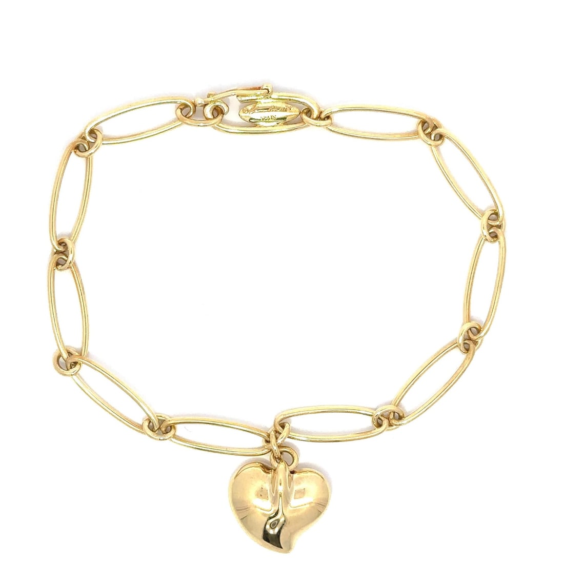 Tiffany & Co. Elsa Peretti 18k Gold Open Link Bracelet with Heart Charm: Tiffany & Co. Elsa Peretti 18k Gold Open Link Bracelet with Heart Charm This exquisite Tiffany & Co. Elsa Peretti bracelet features a stunning open oval link design crafted from solid 18k yellow gold.