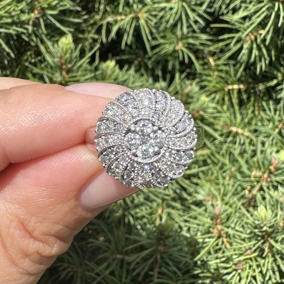 14k White Gold Spiral Ring with 0.70ctw Salt & Pepper Diamonds: 14k White Gold Spiral Ring with 0.70ctw Salt & Pepper Diamonds This exquisite cocktail ring features a stunning spiral design crafted in solid 14k white gold. Adorned with 53 natural genuine diamonds,