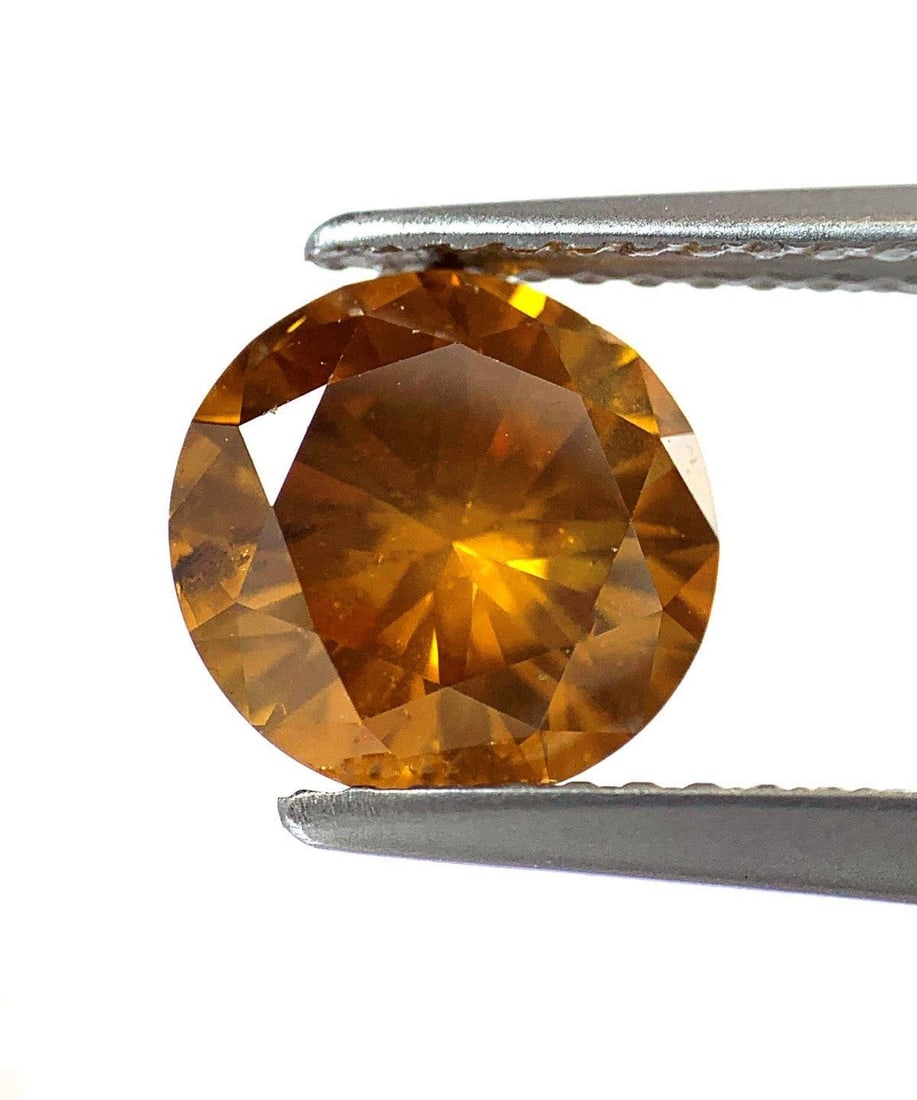 1.83ct Round Cut Fancy Natural Orange Diamond with GIA Certificate: 1.83ct Round Cut Fancy Natural Orange Diamond with GIA Certificate Discover this stunning, untreated 1.83 carat round cut natural diamond featuring a captivating fancy deep brownish yellowish orange c