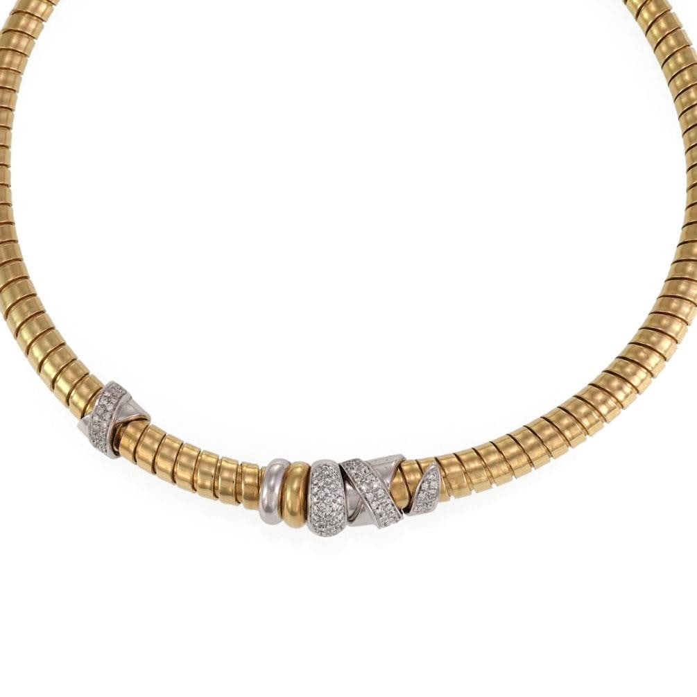 18k Yellow and White Gold Tubogas Diamond Spiral Necklace by Nouvelle Bague: 18k Yellow and White Gold Tubogas Diamond Spiral Necklace by Nouvelle Bague This authentic necklace by Nouvelle Bague is crafted from 18k yellow and white gold in a full-length tubogas flex spiral des