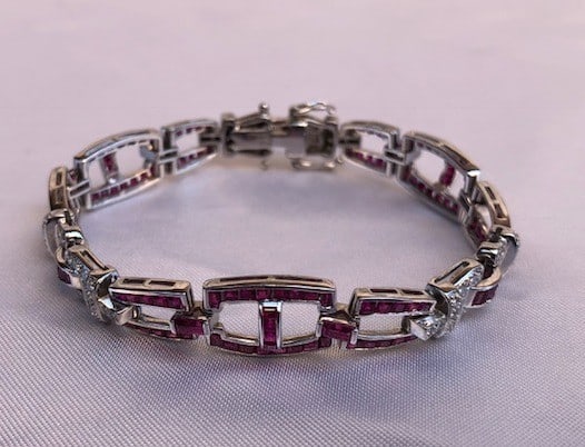 Sophia D Art Deco Platinum Ruby Diamond Wrap Bracelet: Sophia D Art Deco Platinum Ruby Diamond Wrap Bracelet This exquisite Art Deco style bracelet by Sophia D. showcases a stunning combination of platinum, ruby, and diamond. Crafted from high-quality 950
