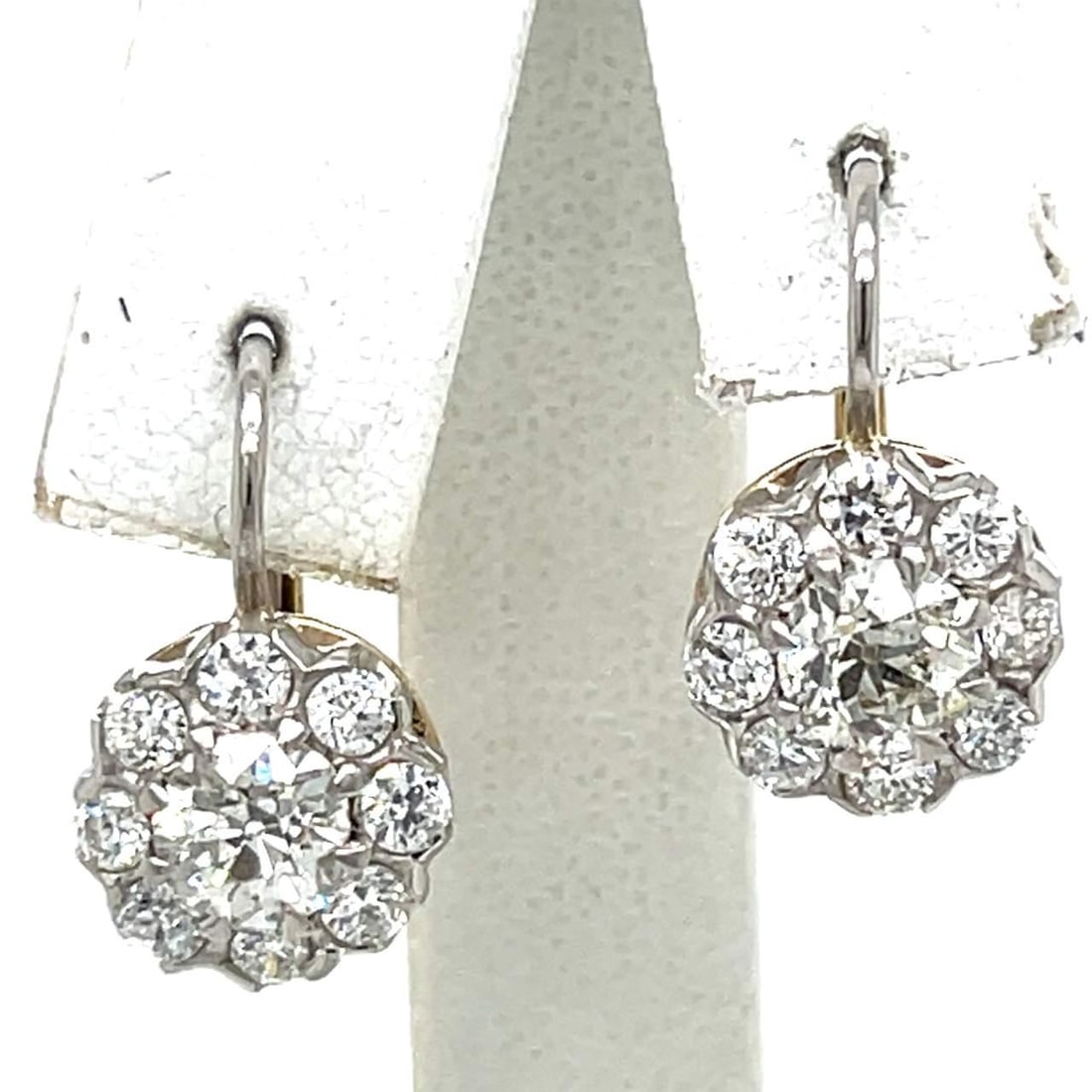 Platinum 18K Yellow Gold Diamond Earrings 2.60 Ct European Old Mine: Platinum 18K Yellow Gold Diamond Earrings 2.60 Ct European Old Mine These exquisite earrings feature a stunning combination of Platinum and 18K Yellow Gold, showcasing a total diamond weight of 2.60 C