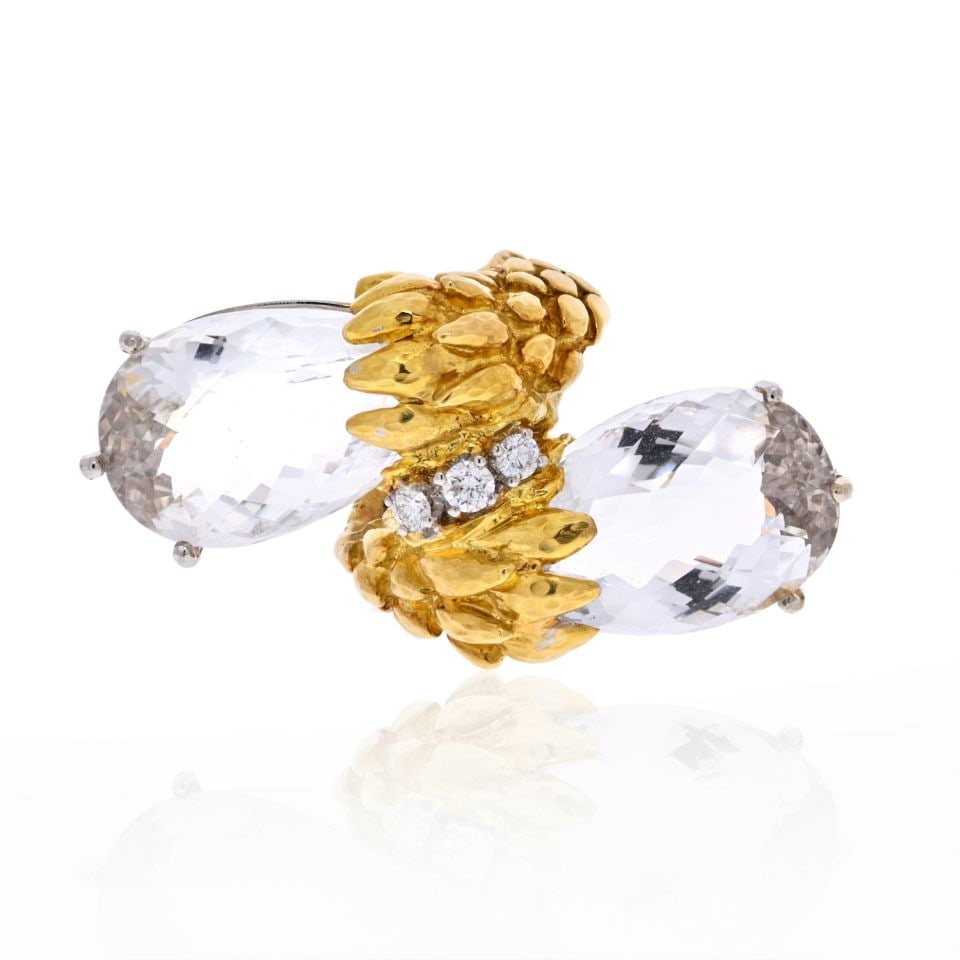 David Webb Rock Crystal Platinum 18K Gold ByPass Ring Signed WEBB: David Webb Rock Crystal Platinum 18K Gold ByPass Ring Signed WEBB This exquisite estate ring by David Webb showcases a stunning design featuring faceted rock crystals beautifully set in a combination