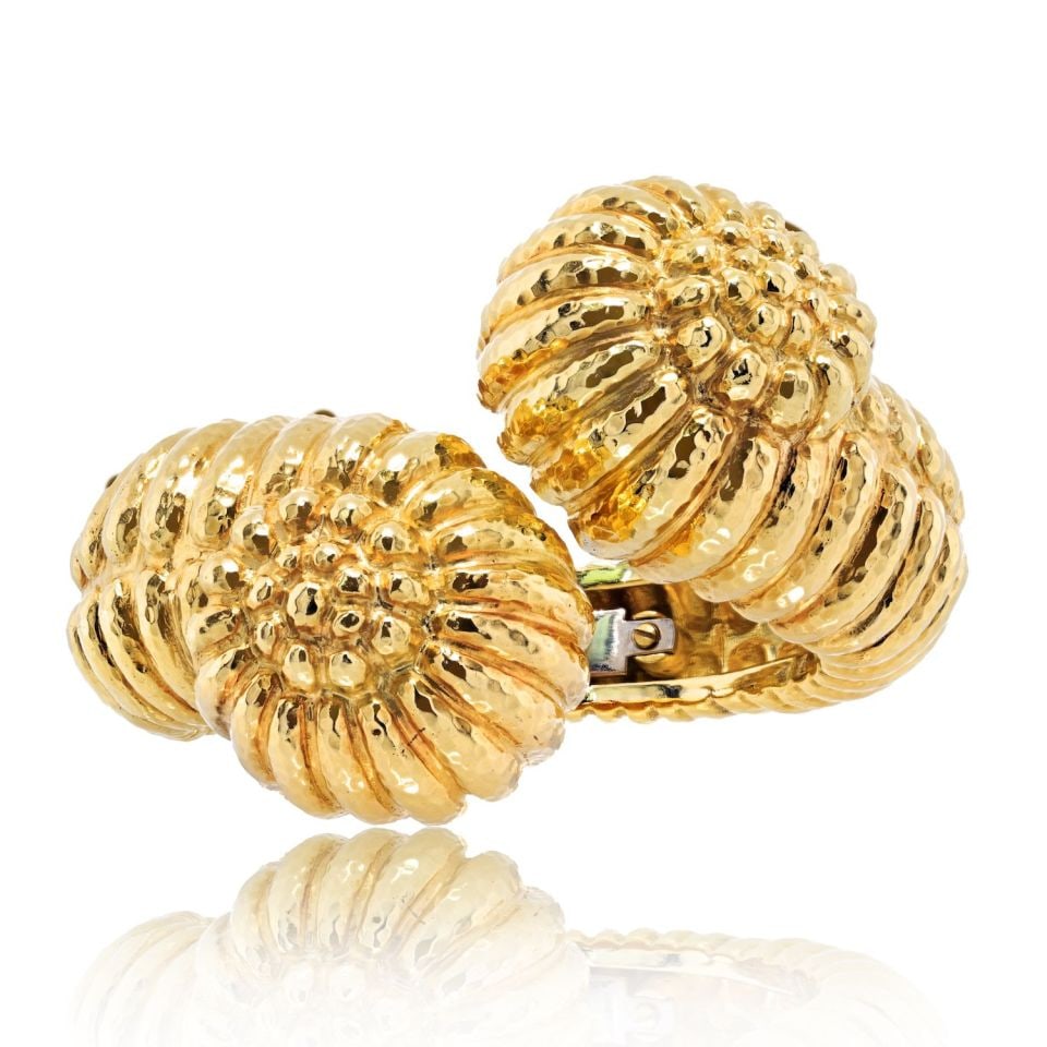 David Webb 18K Yellow Gold Fluted Crossover Bypass Bracelet: David Webb 18K Yellow Gold Fluted Crossover Bypass Bracelet Elevate your style with the David Webb Bypass 18K Yellow Gold Fluted Crossover Bracelet. This exquisite cuff is a true representation of lux