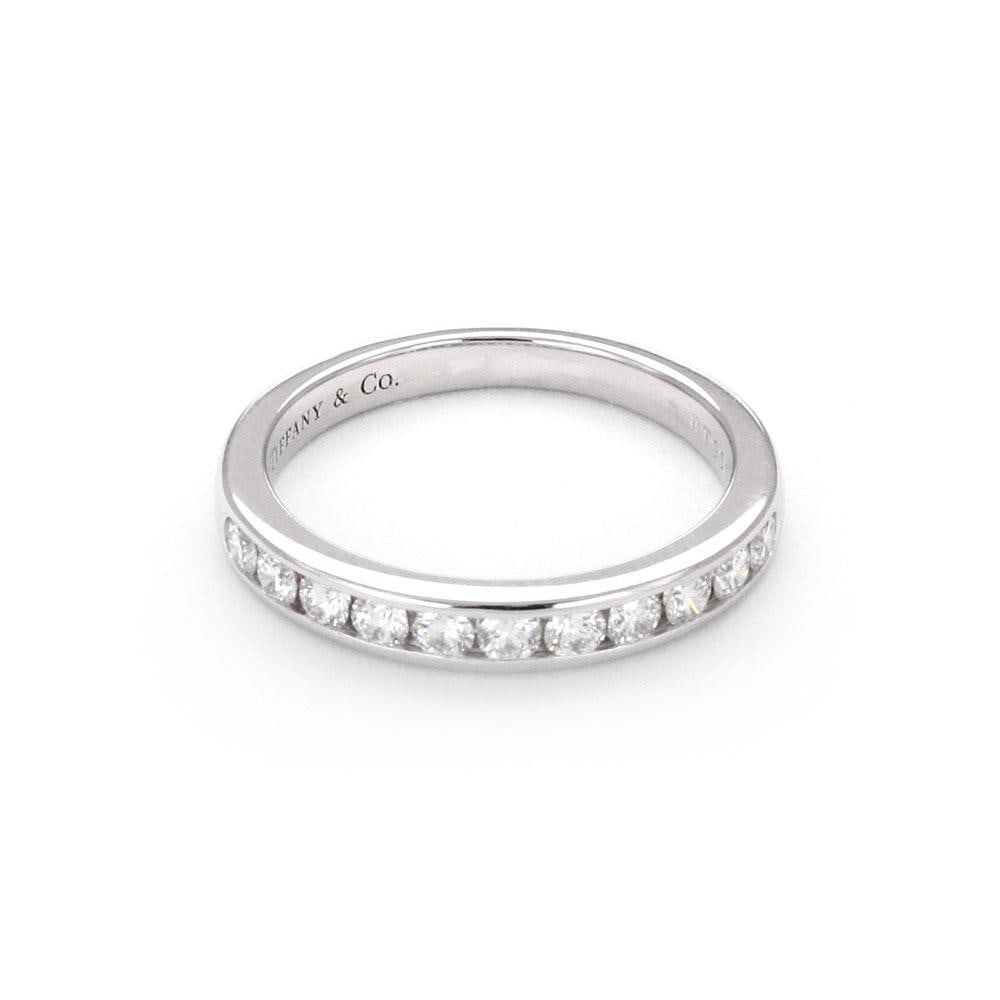 Tiffany & Co Platinum Wedding Band with 11 Diamonds 3mm: Tiffany & Co Platinum Wedding Band with 11 Diamonds 3mm This exquisite wedding band from Tiffany & Co. is crafted from high-quality platinum, showcasing a high polished finish. The band features 11 ro