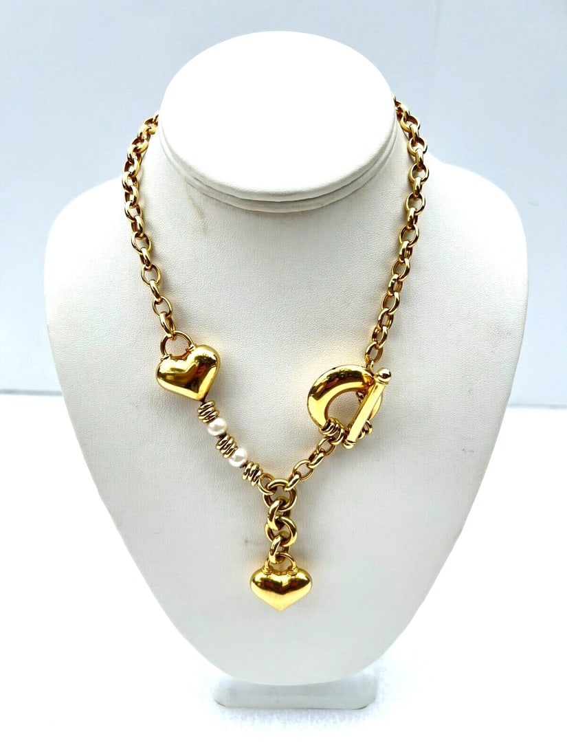Italian 18K Yellow Gold Heart Necklace with Pearls: Italian 18K Yellow Gold Heart Necklace with Pearls This exquisite necklace features a stunning heart design crafted from 18K yellow gold. The piece showcases beautiful pearls, each approximately 0.30"