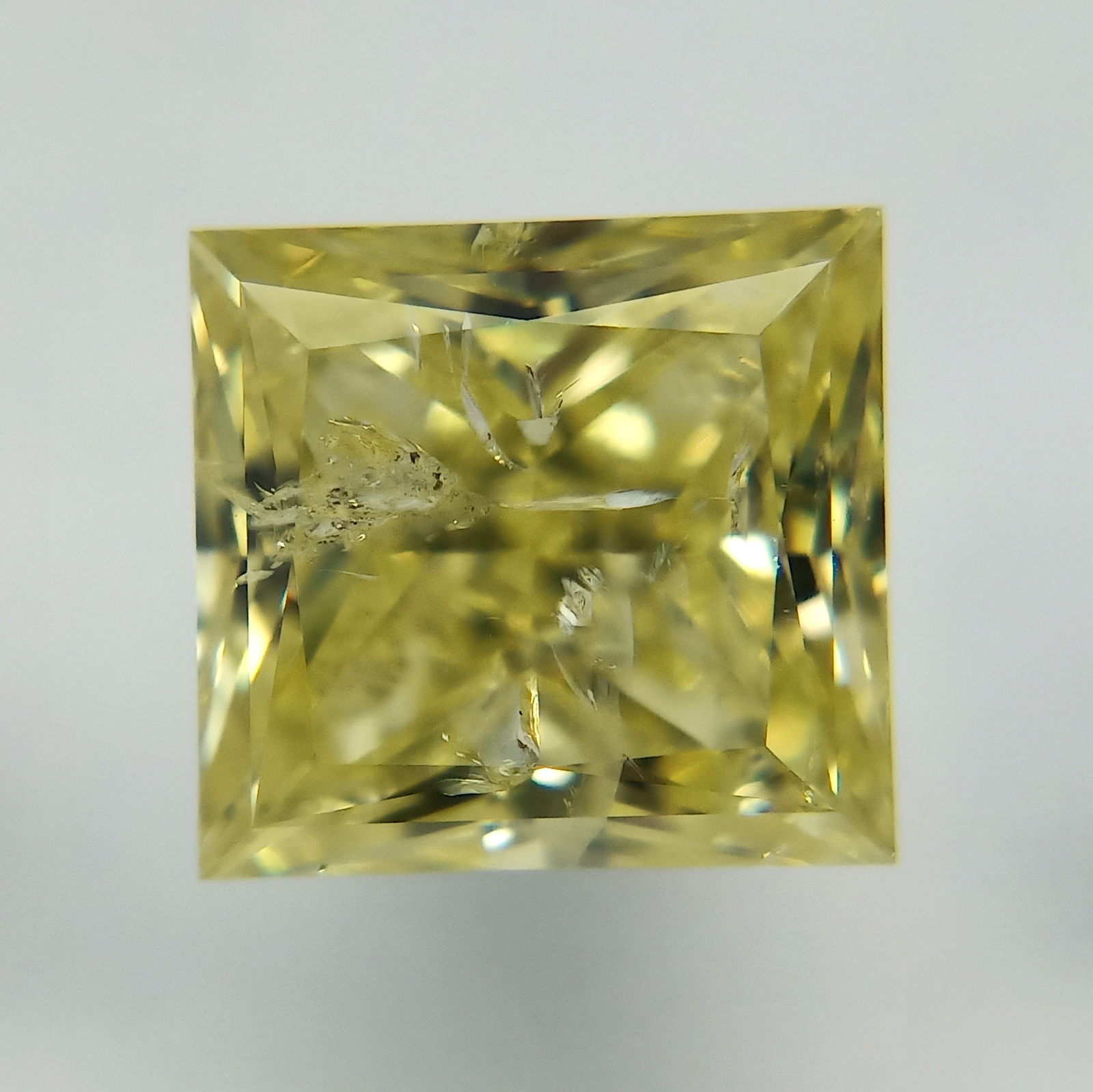 Loose Diamond - PRINCESS 1.69ct Fancy Intense Yellow: Loose Diamond - PRINCESS 1.69ct Fancy Intense Yellow Source: Natural Shape: PRINCESS Carats: 1.69 Color: Fancy Intense Yellow Certification: GIA Video: