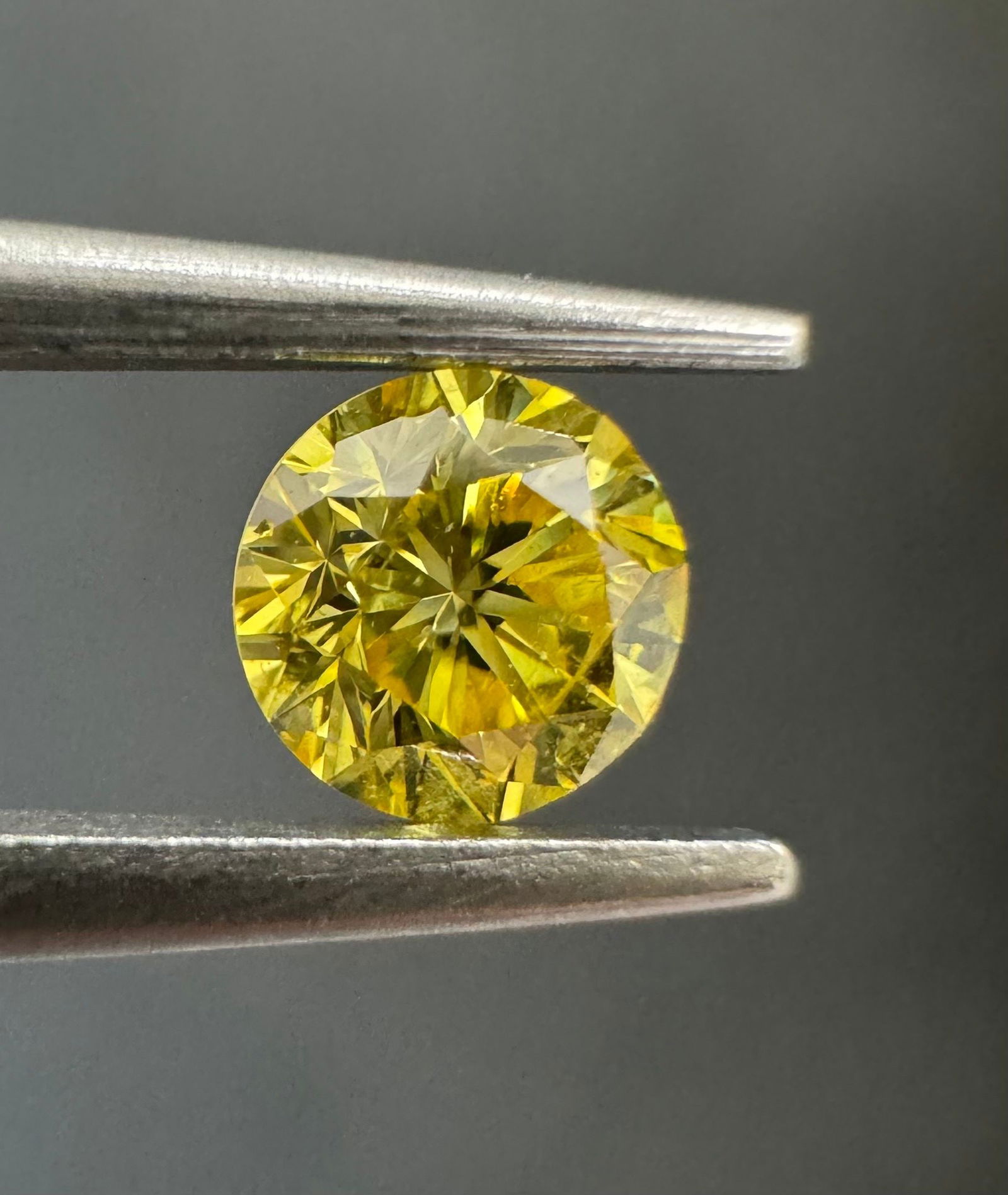 Loose Diamond - ROUND 0.33ct Fancy Vivid Yellow I1: Loose Diamond - ROUND 0.33ct Fancy Vivid Yellow I1 Source: Natural Shape: ROUND Carats: 0.33 Color: Fancy Vivid Yellow Certification: GIA PLEASE NOTE: Framed, Large, or heavy items do not have shippin