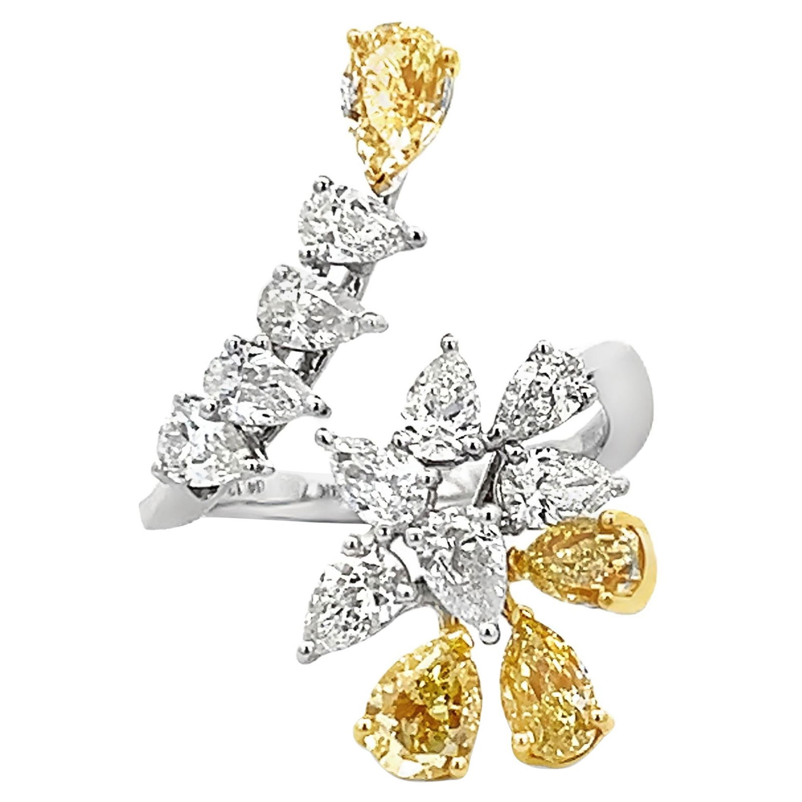 4.13ct Yellow White Diamond Bypass Ring 18k Gold: 4.13ct Yellow White Diamond Bypass Ring 18k Gold This exquisite bypass ring features a stunning modern design, showcasing 4.13 carats of pear-shaped yellow and white diamonds. The ring is crafted from