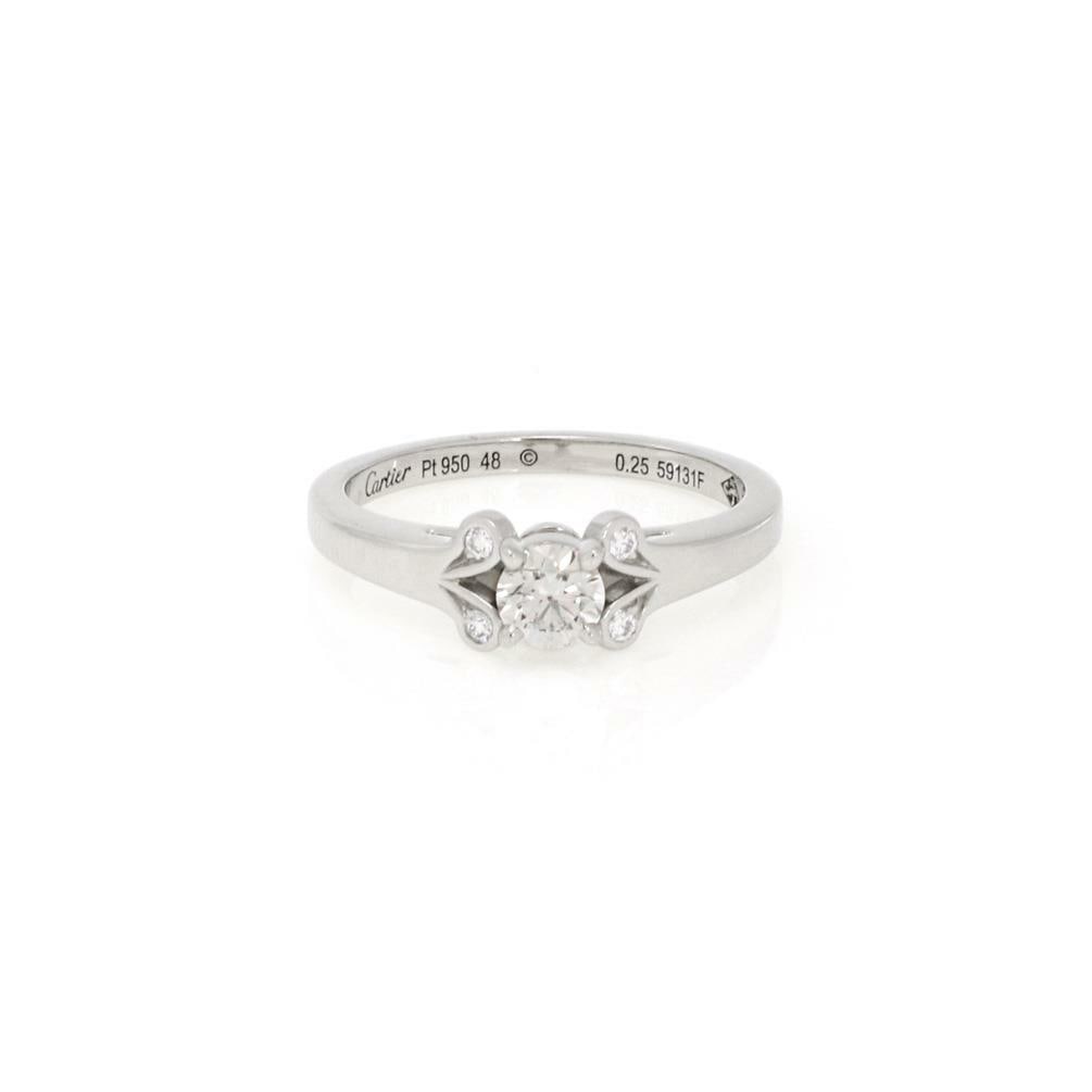 Cartier Platinum Diamond Engagement Ring 0.28ct Size 4.5 with Paper: Cartier Platinum Diamond Engagement Ring 0.28ct Size 4.5 with Paper This exquisite engagement ring from Cartier is a stunning blend of elegance and craftsmanship. Made from premium platinum, it featur
