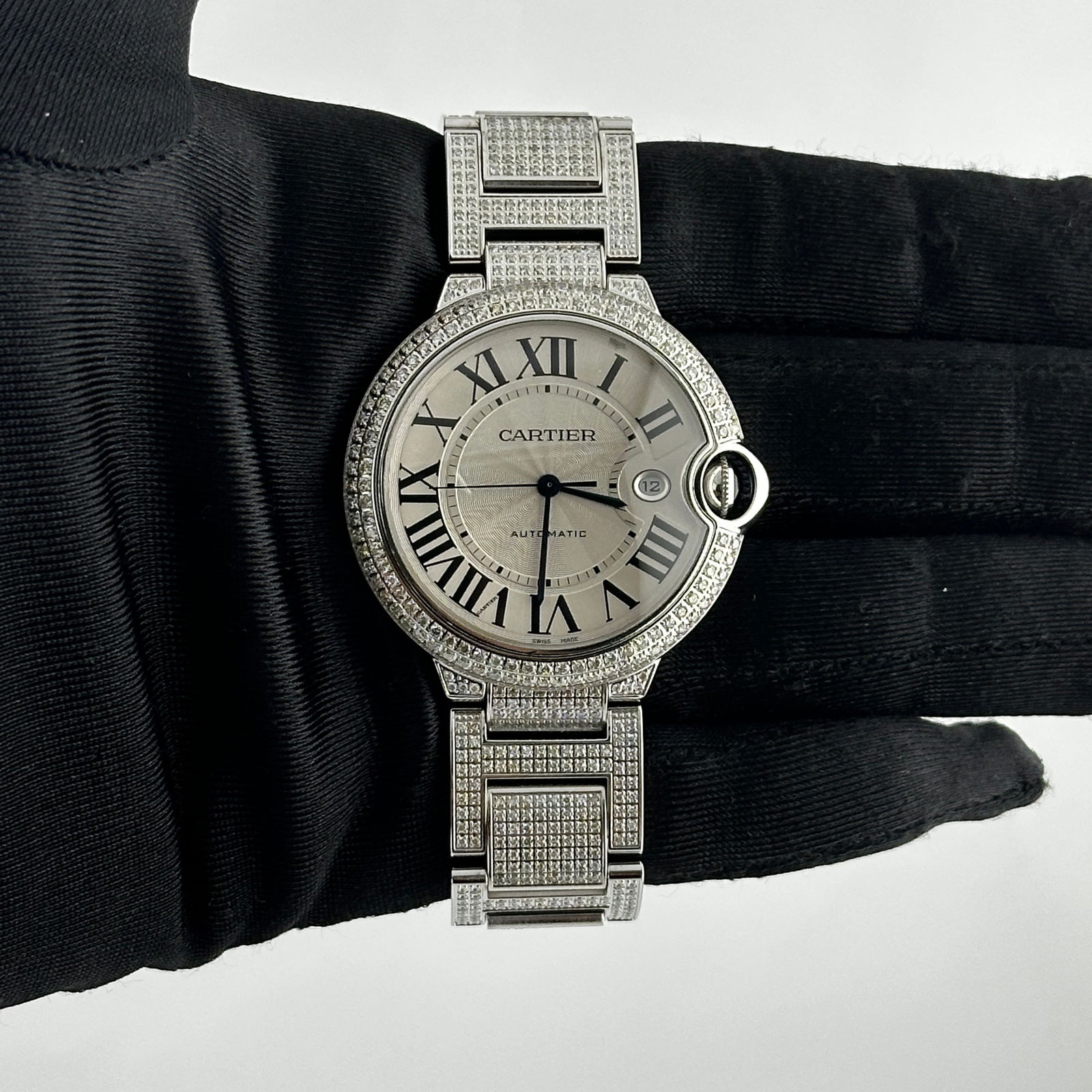 Ballon Bleu Ref 3001 Silver Roman Diamond Bezel and Bracelet Watch: Ballon Bleu Ref 3001 Silver Roman Diamond Bezel and Bracelet Watch This Cartier Ballon Bleu watch features a silver Roman numeral dial, a diamond-set bezel, and a diamond bracelet. The reference numbe