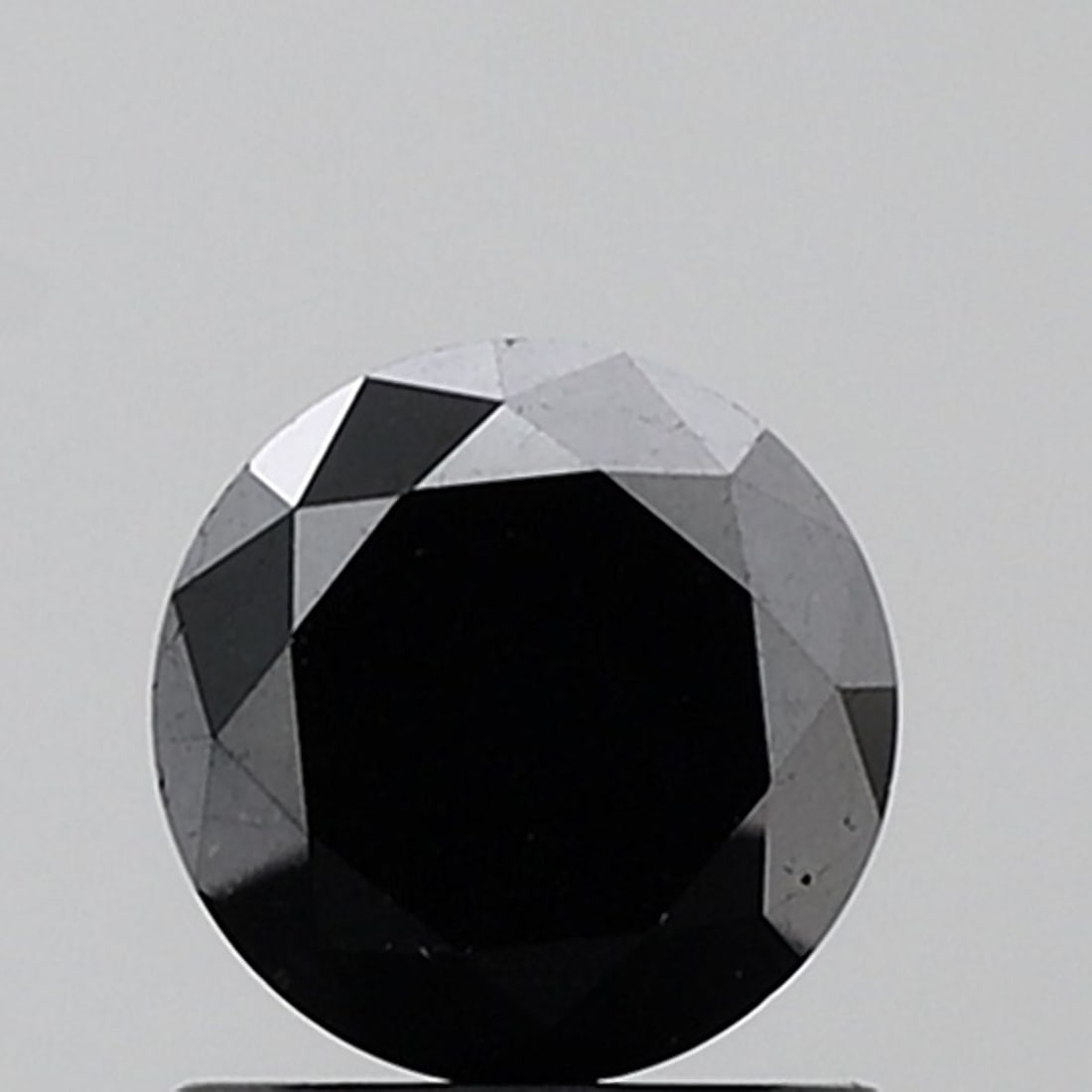 Loose Diamond - ROUND 1.13ct Fancy Black VS2: Loose Diamond - ROUND 1.13ct Fancy Black VS2 Source: Natural Shape: ROUND Carats: 1.13 Color: Fancy Black Certification: NONE Video: