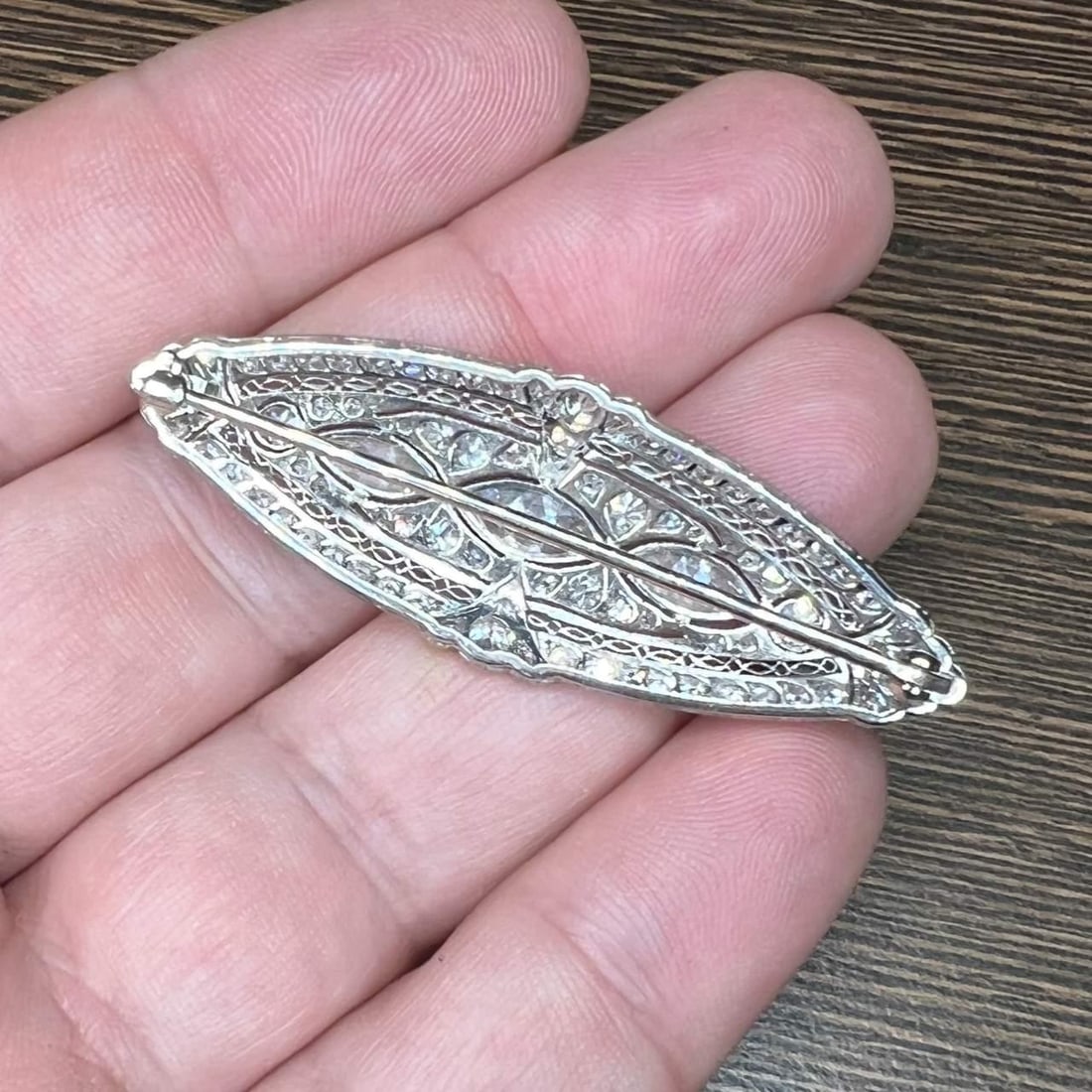 Art Deco Platinum Diamond Brooch 4.60 Ct GIA Certified Marquise: Art Deco Platinum Diamond Brooch 4.60 Ct GIA Certified Marquise This exquisite Art Deco brooch features a stunning arrangement of diamonds set in platinum. Weighing 8.2 grams, the piece is adorned wit