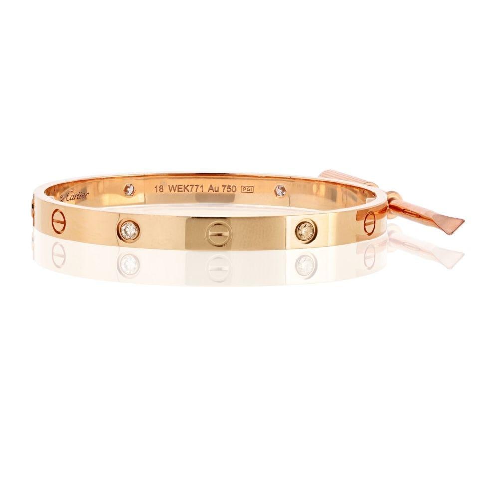 Love Bracelet in 18K Rose Gold with Four Diamonds Size 18 by Cartier: Love Bracelet in 18K Rose Gold with Four Diamonds Size 18 by Cartier This Cartier Love bracelet is crafted from 18K rose gold and features four diamonds. It is a size 18 and has a total weight of 32.6