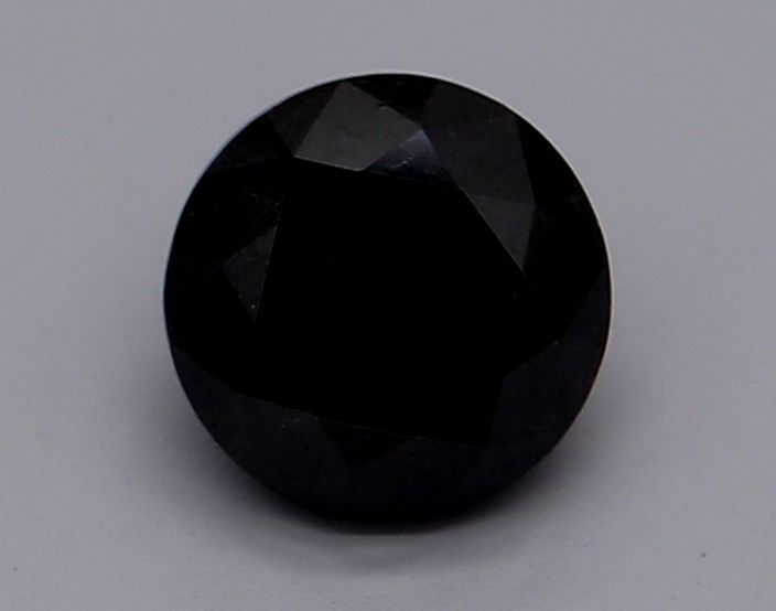 Loose Diamond - ROUND 0.6ct Fancy Black VVS2: Loose Diamond - ROUND 0.6ct Fancy Black VVS2 Source: Natural Shape: ROUND Carats: 0.6 Color: Fancy Black Certification: GIA Video: