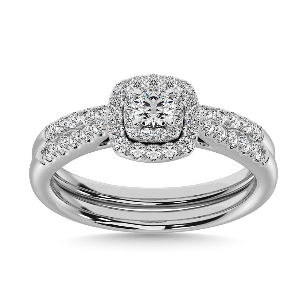 10K White Gold 2/5 Ct.tw Diamond Bridal Ring: 10K White Gold 2/5 Ct.tw Diamond Bridal Ring Win her heart with this exceptional diamond bridal ring. Created in 10K white gold, the eye is drawn to the round diamond center stone. A halo frame of sma