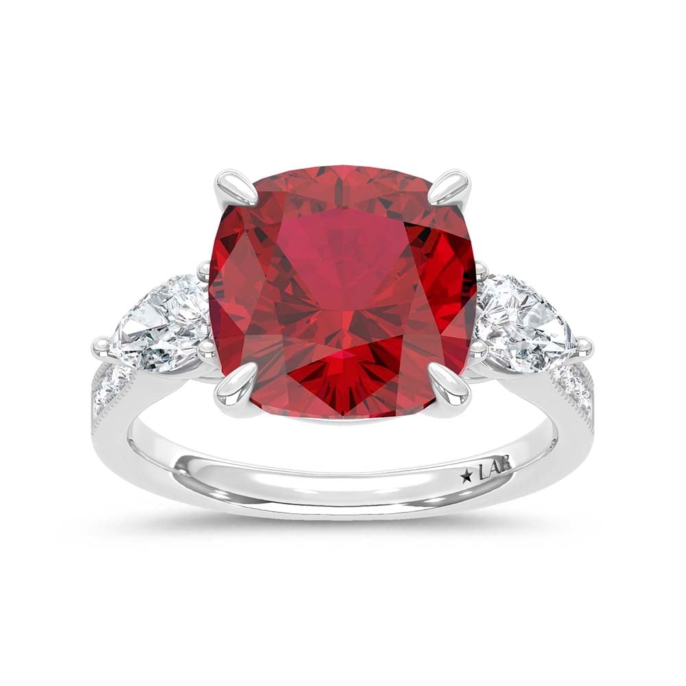 14K White Gold Lab Grown Diamond 6 1/2 Ct.Tw. Cushion Shape Recrystalized Ruby Engagement Ring: 14K White Gold Lab Grown Diamond 6 1/2 Ct.Tw. Cushion Shape Recrystalized Ruby Engagement Ring (Center 5 3/4 ct) Exude grand elegance with this 14K white gold engagement ring, featuring a breathtaking