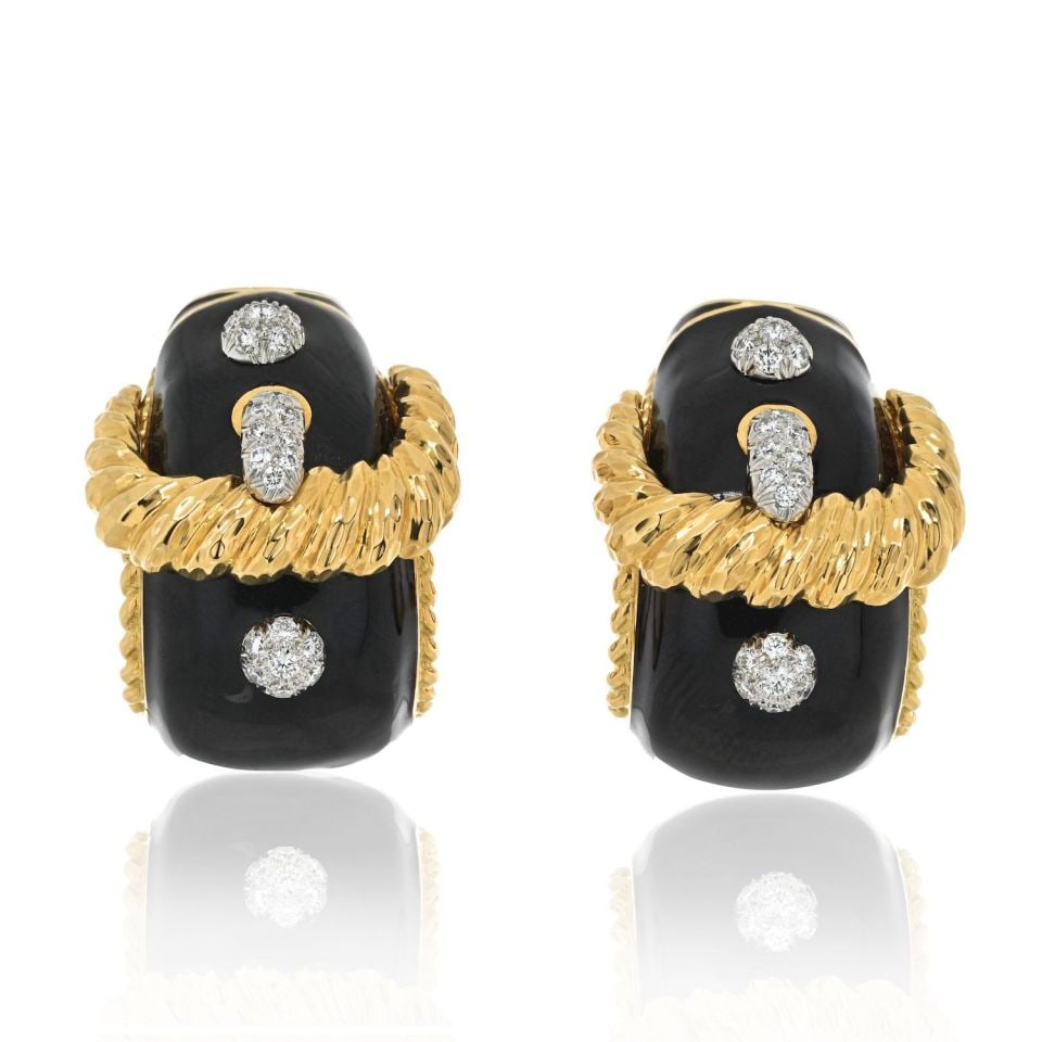 David Webb Platinum 18K Gold Buckle Clip-On Earrings with Diamonds: David Webb Platinum 18K Gold Buckle Clip-On Earrings with Diamonds Introducing a striking pair of David Webb signature buckle design earrings that exude a bold and captivating presence. These unique c