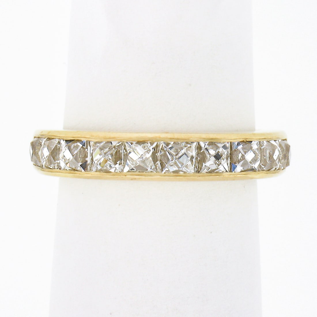 18k Yellow Gold 1.75ctw French Cut Channel Set Diamond Wedding Band: 18k Yellow Gold 1.75ctw French Cut Channel Set Diamond Wedding Band This exquisite wedding band ring features solid 18k yellow gold and showcases a total of 1.75 carats of stunning square French cut d