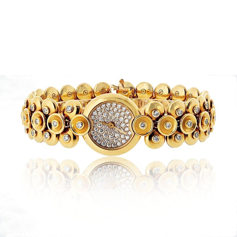 Van Cleef & Arpels 18K Gold Bouton d'Or Diamond Dial Vintage Watch: Van Cleef & Arpels 18K Gold Bouton d'Or Diamond Dial Vintage Watch This exquisite Van Cleef & Arpels Bouton d'Or watch is a perfect blend of luxury and functionality. Crafted from rich 18K yellow gold