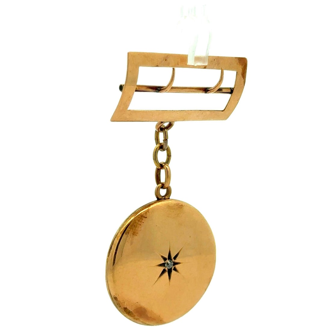 Victorian 9K Yellow Gold Diamond Swivel Buckle Brooch with Locket: Victorian 9K Yellow Gold Diamond Swivel Buckle Brooch with Locket This exquisite Antique Victorian Buckle Brooch features a stunning dangle locket crafted from 9 karat yellow gold. The brooch showcase