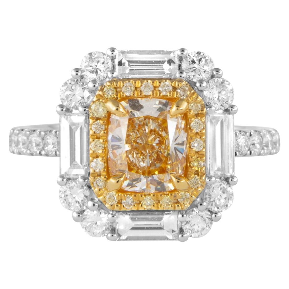 1.20ct Fancy Yellow Diamond Halo Ring 18k Gold: 1.20ct Fancy Yellow Diamond Halo Ring 18k Gold This exquisite 1.20ct Cushion Fancy Yellow Diamond Ring is a stunning piece of contemporary jewelry crafted from 18k two-tone gold. The ring features a c