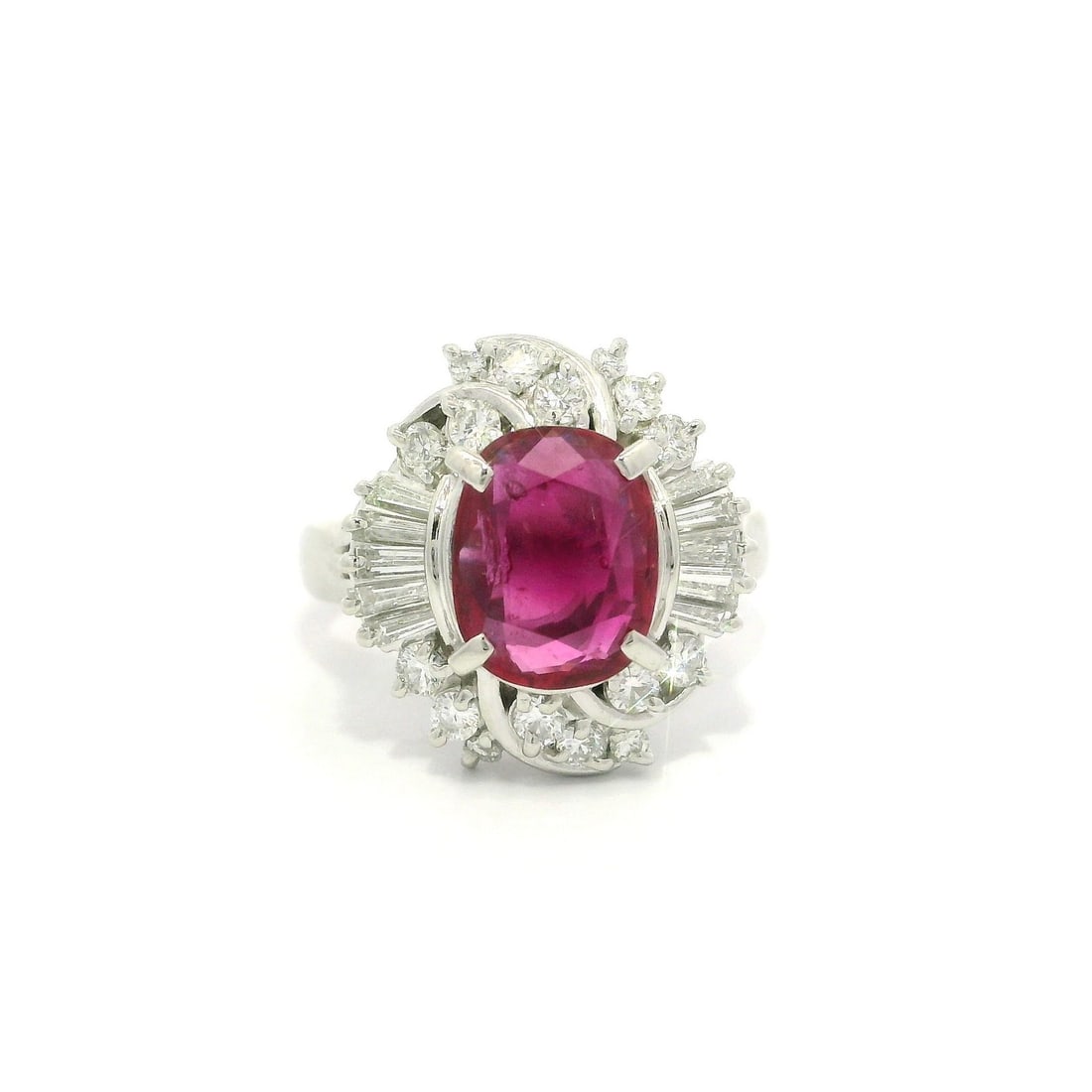 Platinum GIA Certified 1.68ctw Cushion Ruby & Diamond Cocktail Ring: Platinum GIA Certified 1.68ctw Cushion Ruby & Diamond Cocktail Ring This exquisite cocktail ring showcases a stunning natural cushion ruby, prong set to highlight its deep red color and weighing 1.27c