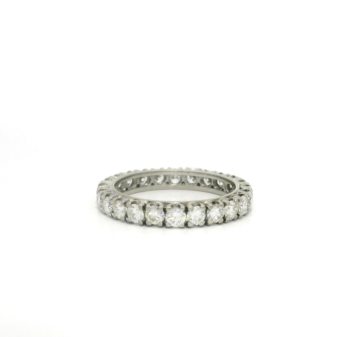 Vintage 1.20ctw Diamond Eternity Band Ring in White Gold and Palladium: Vintage 1.20ctw Diamond Eternity Band Ring in White Gold and Palladium This exquisite vintage eternity band ring showcases a stunning array of 24 natural round-cut diamonds, prong set, with a total ca