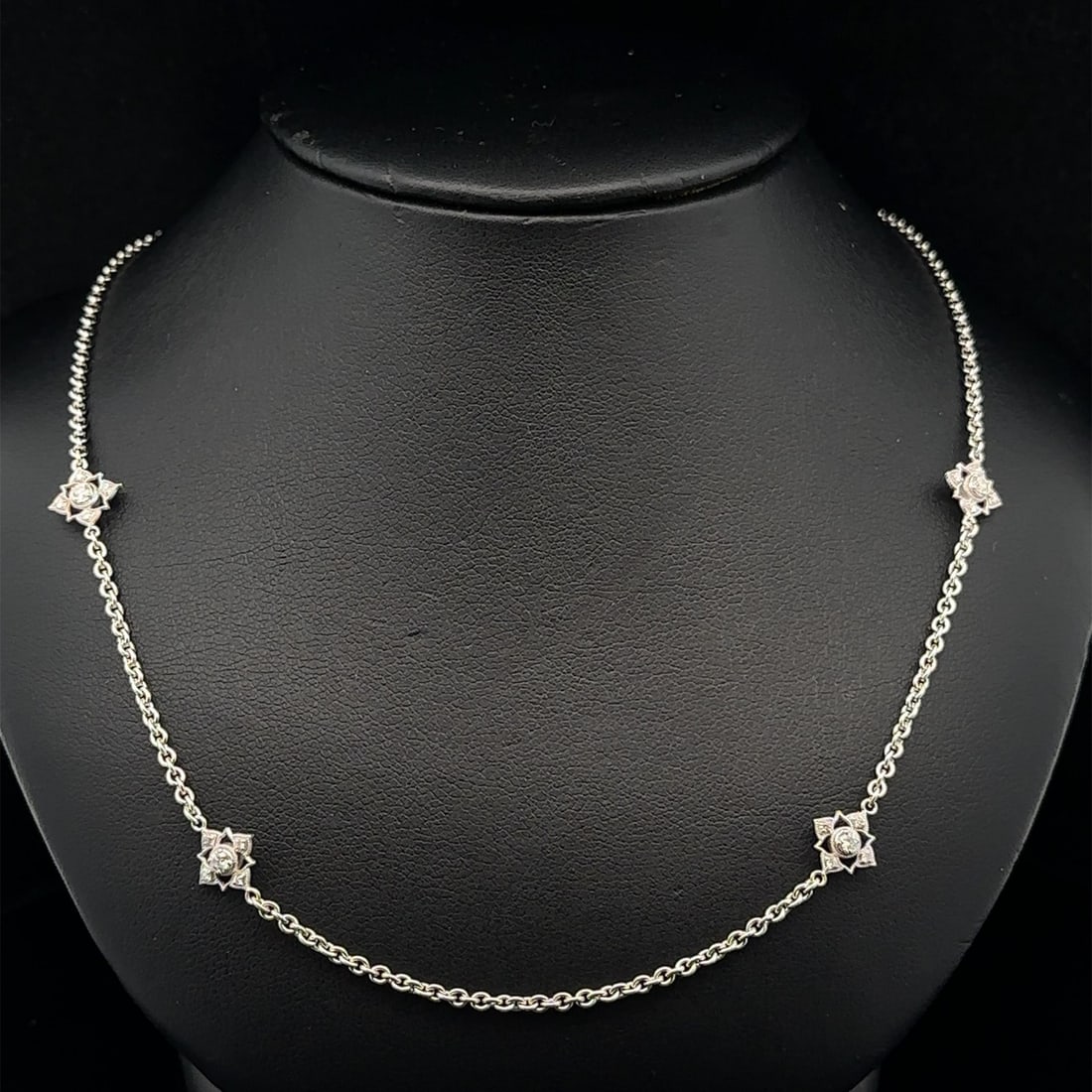 White Gold 0.40ctw Diamond Reversible Flower Necklace 16 Inches: White Gold 0.40ctw Diamond Reversible Flower Necklace 16 Inches This exquisite necklace features a beautiful reversible flower station design crafted from solid 17-18k white gold. Adorned with 40 natu