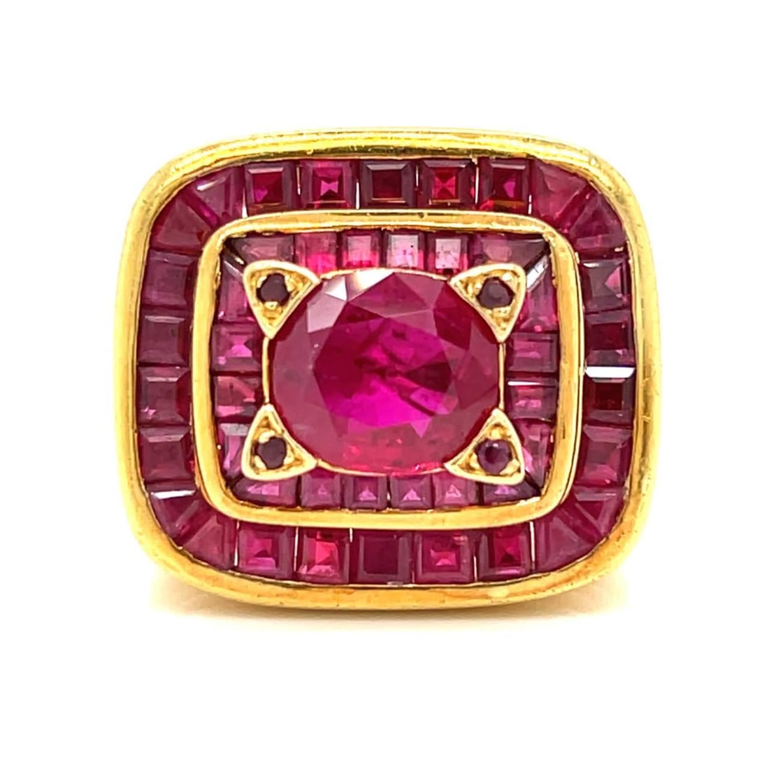 18K Yellow Gold GIA Certified Burma Ruby Ring with 50 Smaller Rubies: 18K Yellow Gold GIA Certified Burma Ruby Ring with 50 Smaller Rubies This stunning 18K Yellow Gold ring features a GIA Certified Burma Ruby at its center, weighing approximately 3.00 Ct. The ring is b