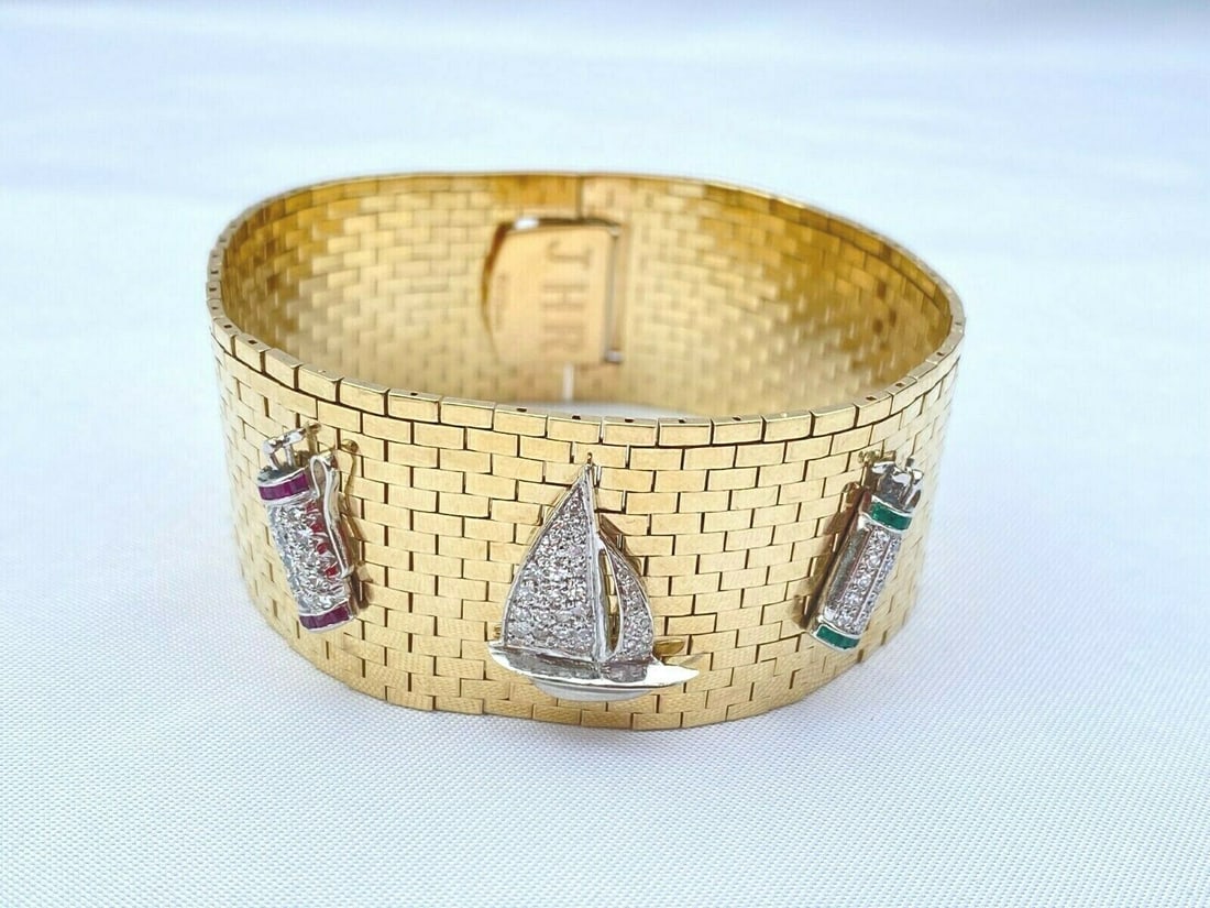 French Retro 14K Gold Diamond Ruby Platinum Bracelet Signed DFS14K: French Retro 14K Gold Diamond Ruby Platinum Bracelet Signed DFS14K Discover the elegance of this exquisite French retro bracelet, crafted in 1950 from a luxurious combination of 14K gold and platinum,