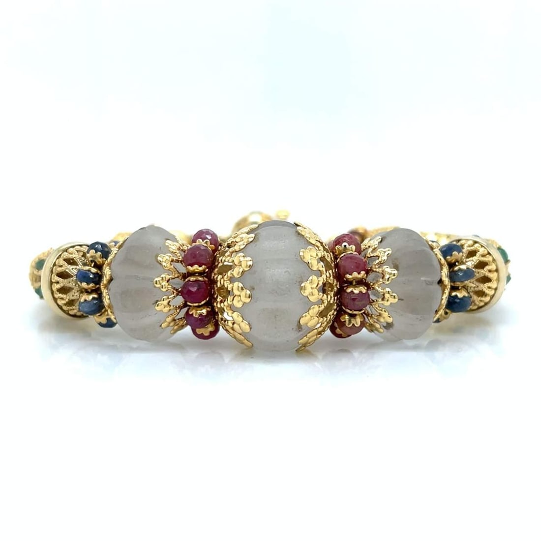 18K Yellow Gold Bracelet with 9.00 Ct Rubies Emeralds Sapphires Italian Hallmarks: 18K Yellow Gold Bracelet with 9.00 Ct Rubies Emeralds Sapphires Italian Hallmarks This exquisite bracelet is crafted from 18K yellow gold and features a stunning combination of rubies, emeralds, and s