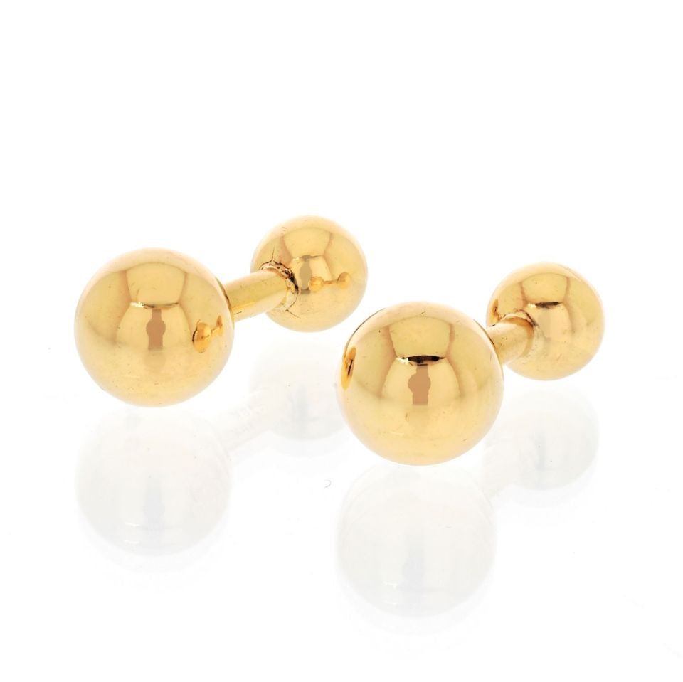Cartier 18K Yellow Gold Ball Cuff Links 1.1 Inches: Cartier 18K Yellow Gold Ball Cuff Links 1.1 Inches Elevate your formal attire with these exquisite Cartier cuff links, crafted from luxurious 18K yellow gold. With a weight of 11.1 grams, these cuff l
