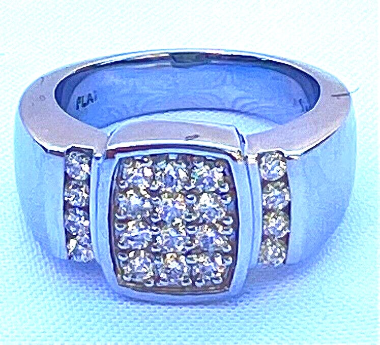 Stunning Platinum Diamond Ring 0.65ct Size 8 Hallmarked: Stunning Platinum Diamond Ring 0.65ct Size 8 Hallmarked This stunning platinum diamond ring, sized 8, features exquisite craftsmanship and a timeless design. Made from 950 platinum, the ring showcases