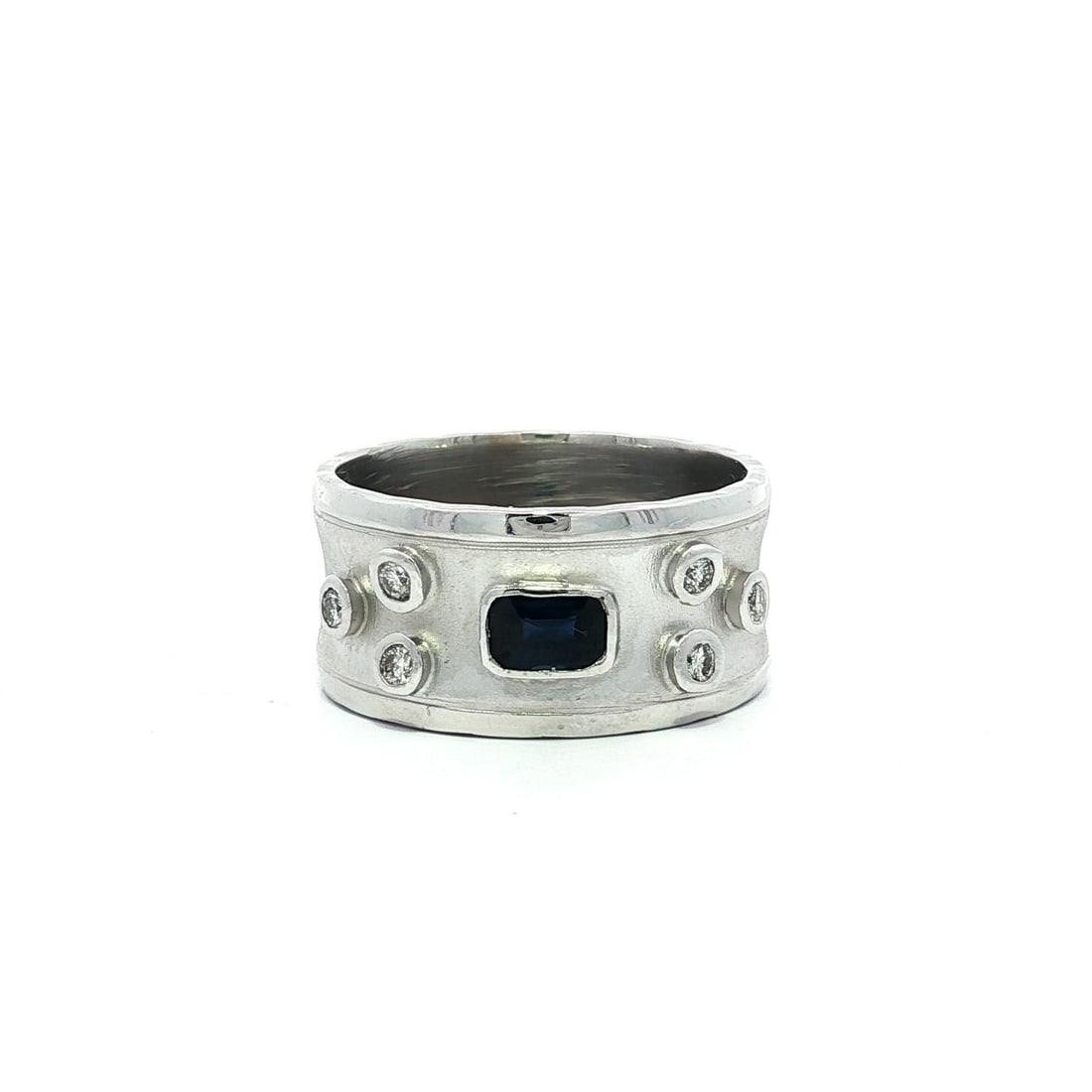 14k White Gold Sapphire Diamond Wide Band Ring Brushed Polished Finish: 14k White Gold Sapphire Diamond Wide Band Ring Brushed Polished Finish This exquisite wide band ring is crafted from solid 14k white gold, featuring a stunning array of gemstones. The centerpiece is a
