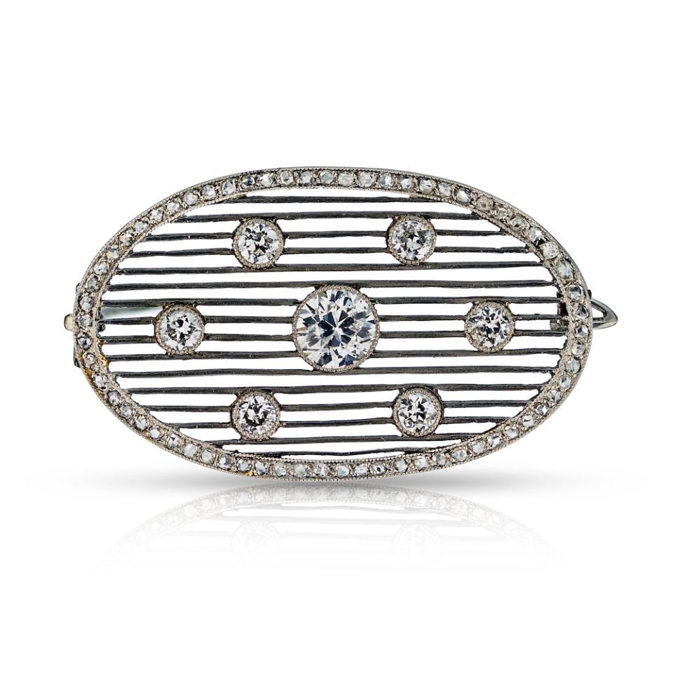 Edwardian Platinum Brooch with 2.5 Carat Old-European Cut Diamonds: Edwardian Platinum Brooch with 2.5 Carat Old-European Cut Diamonds This exquisite Edwardian brooch is crafted from platinum and features a stunning arrangement of old-European cut diamonds. Weighing a