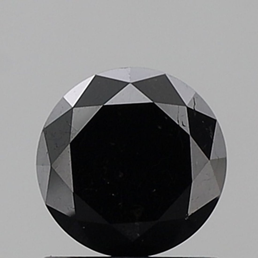 Loose Diamond - ROUND 1.22ct Black VS1: Loose Diamond - ROUND 1.22ct Black VS1 Source: Natural Shape: ROUND Carats: 1.22 Color: Black Certification: NONE Video: