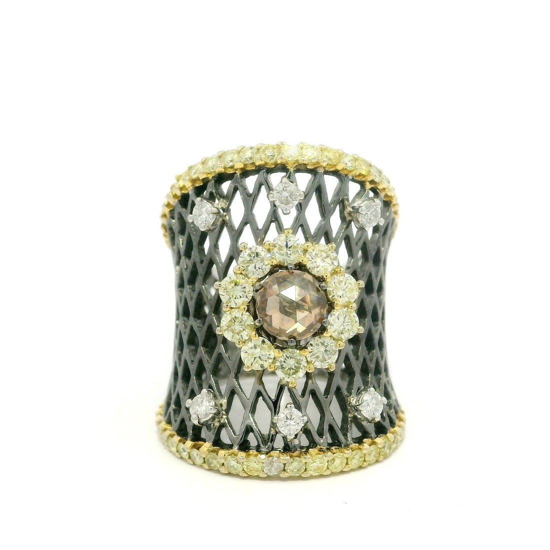 18k Gold Rhodium Fancy Diamond Cluster Wide Band Ring 2.53ctw: 18k Gold Rhodium Fancy Diamond Cluster Wide Band Ring 2.53ctw This stunning 18k Solid Gold Rhodium band ring features a captivating cluster of diamonds, perfect for adding a touch of elegance to any o